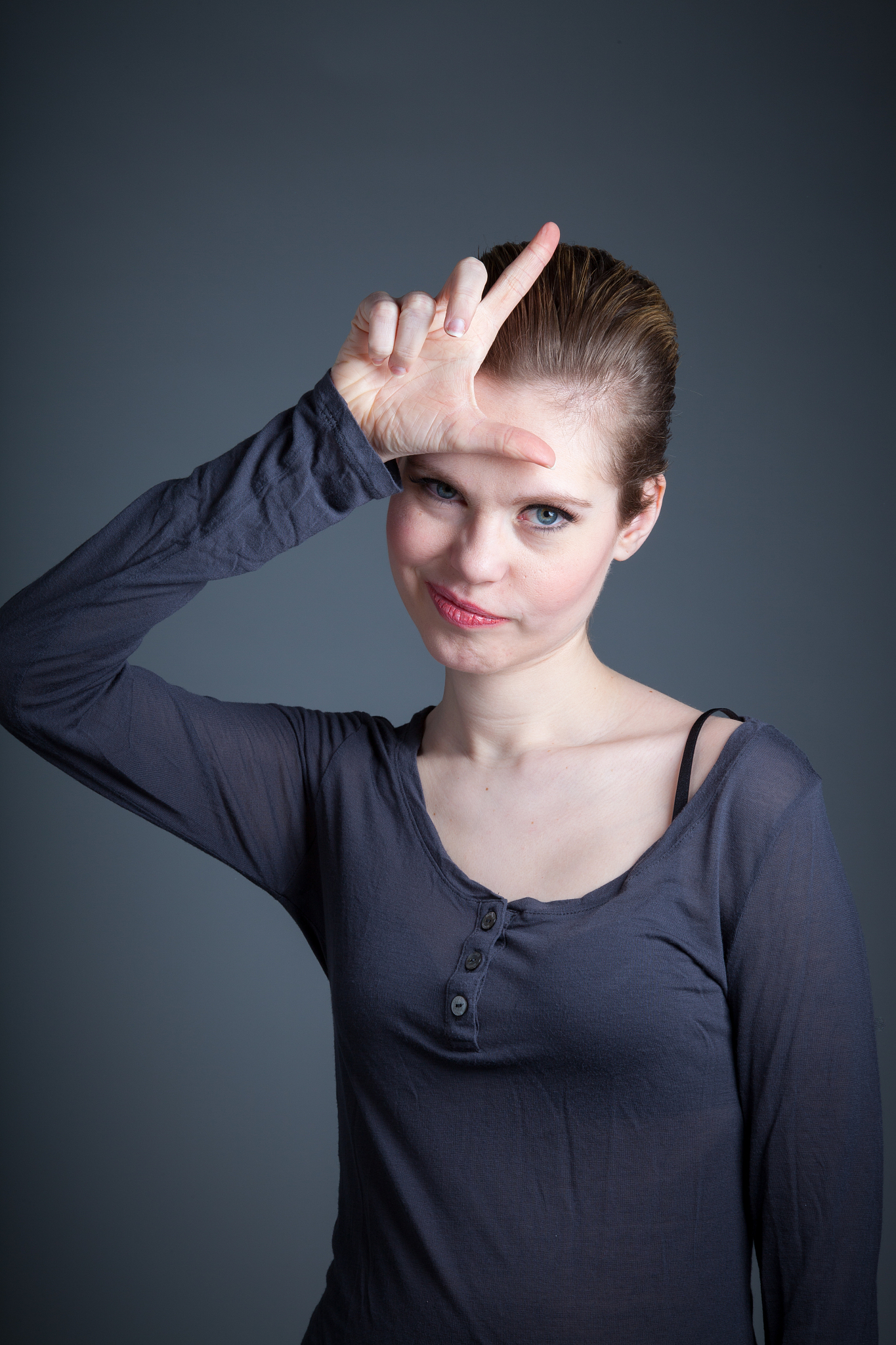 attractive woman isolated on grey background