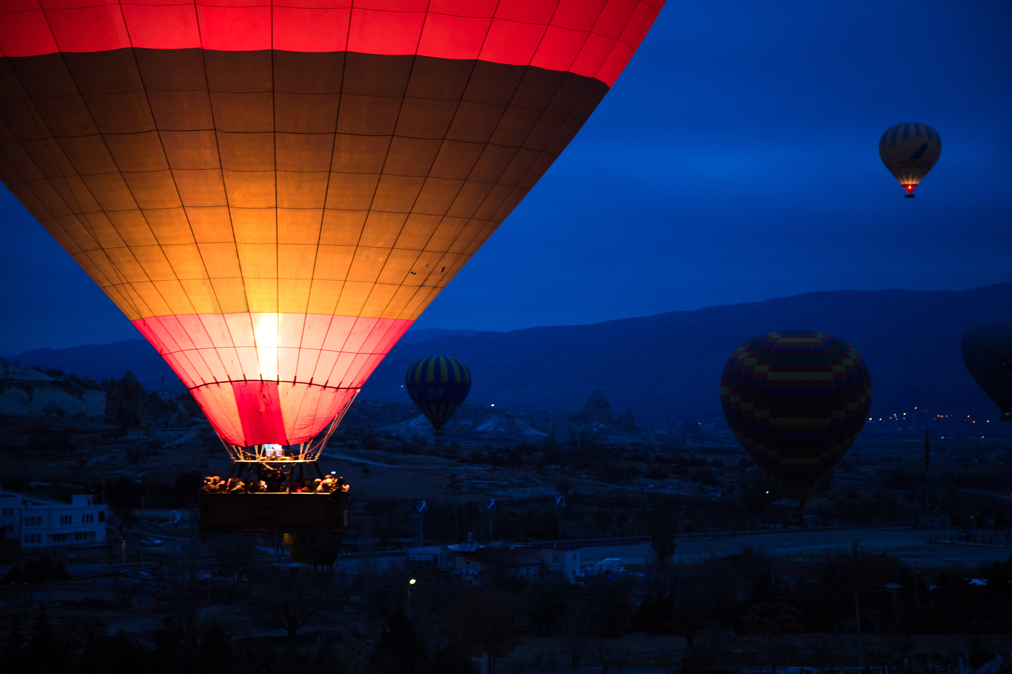 balloons take off in the morning in cappadocia