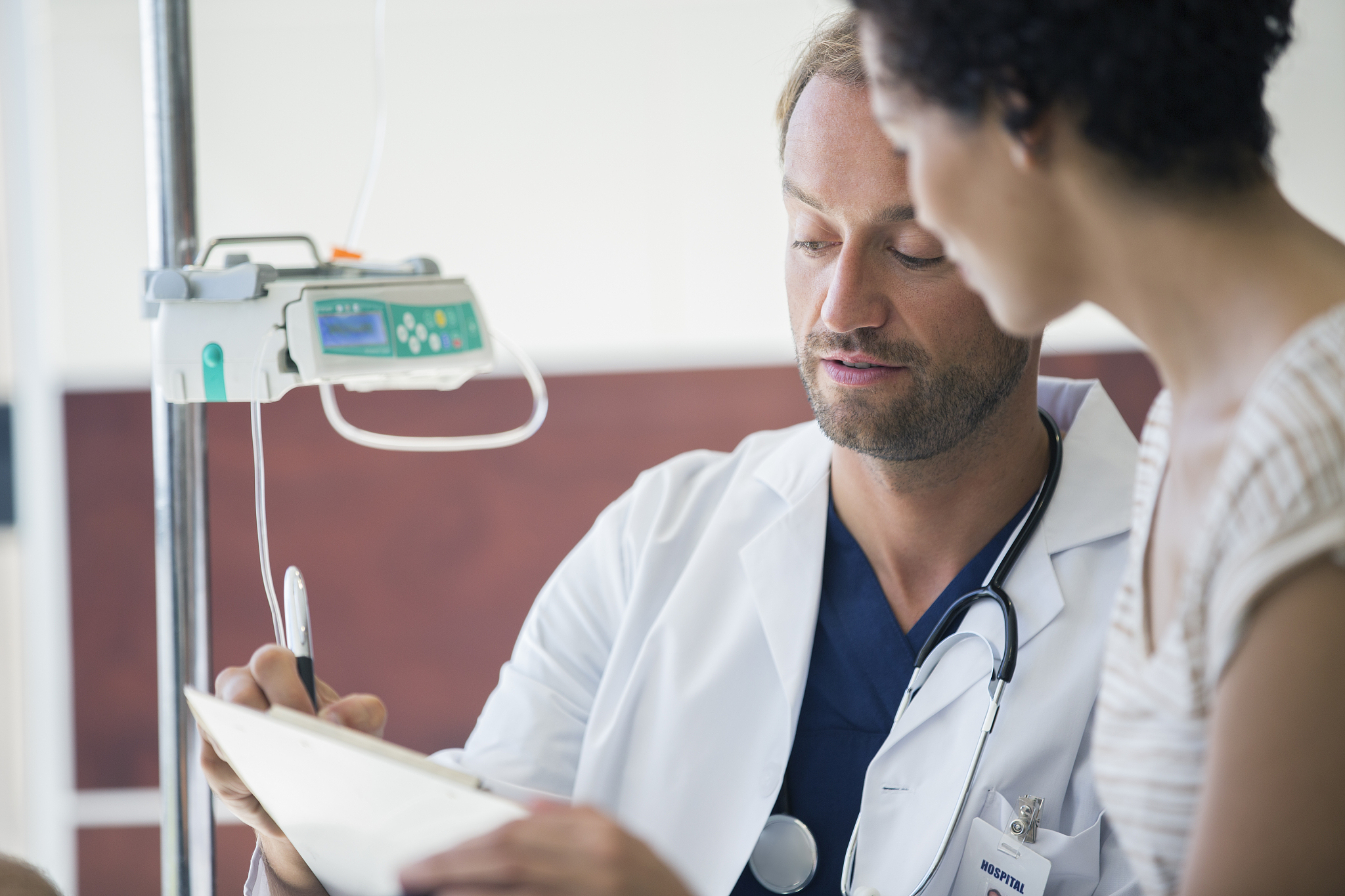 doctor and patient talking in hospital