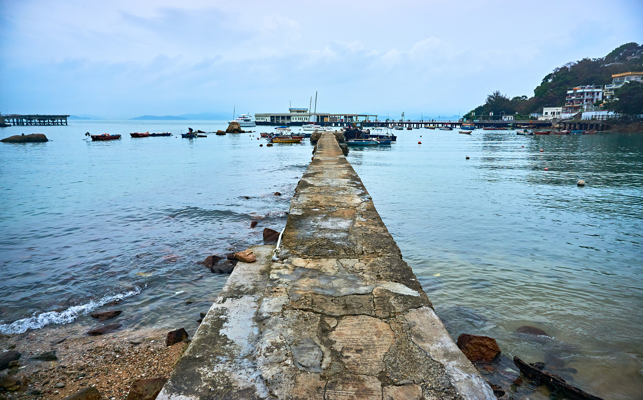 long jetty leading to calm sea