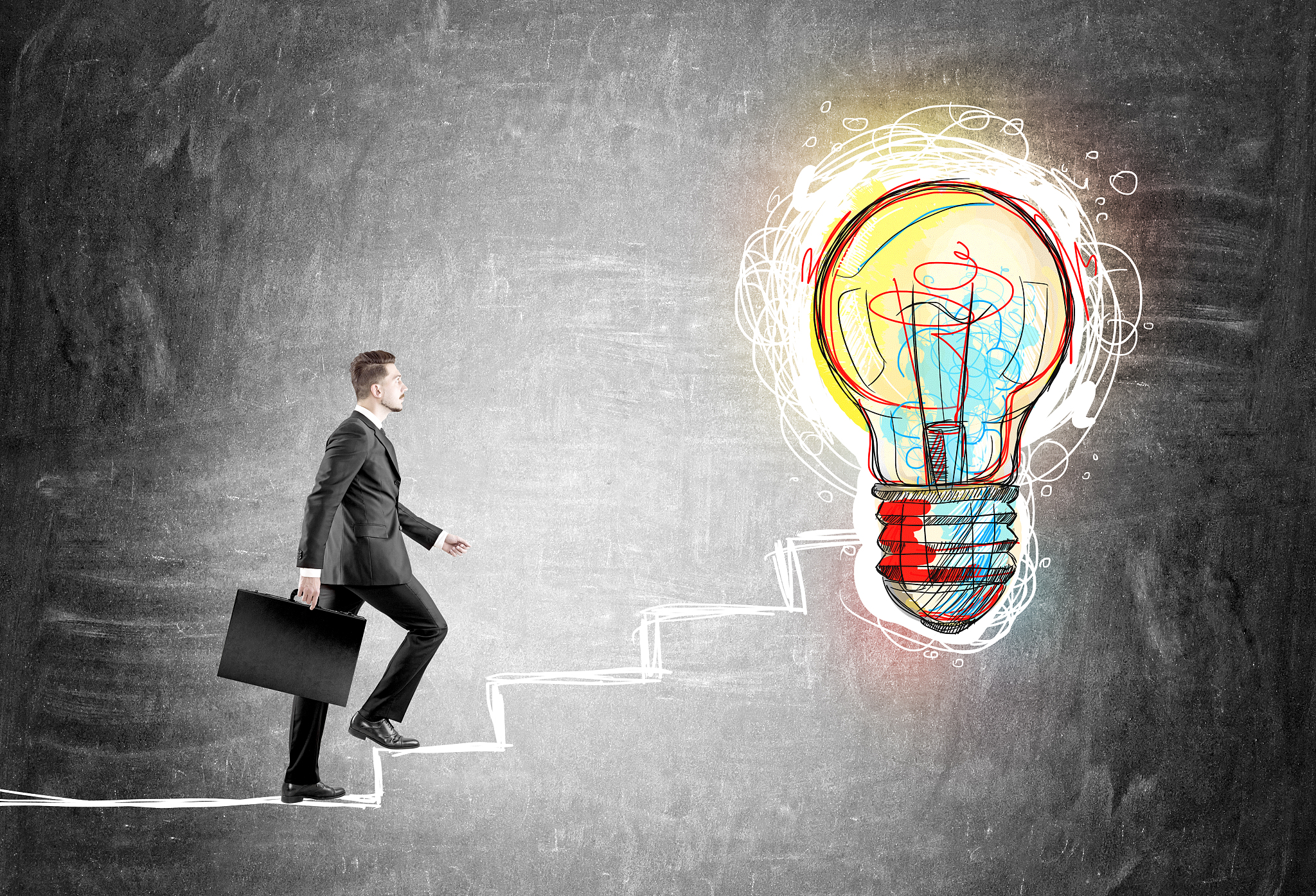 businessman climbing drawn stairs