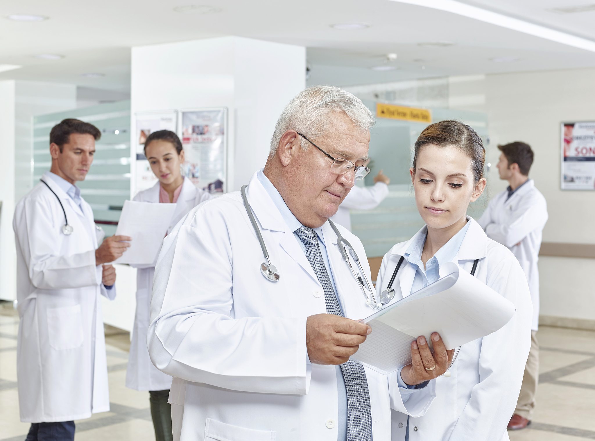 group of doctors in hospital corridor