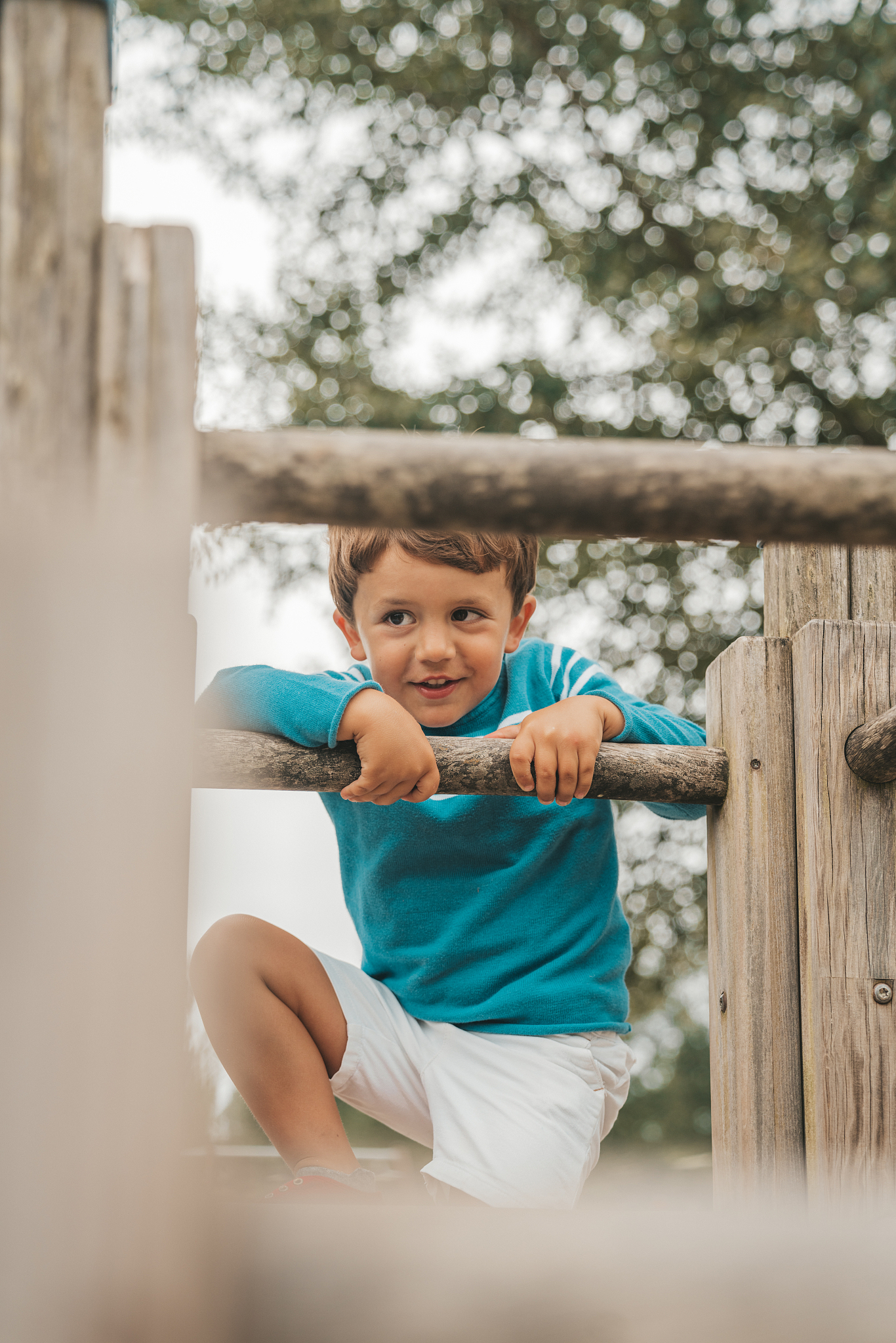 little boy climbing on the playground