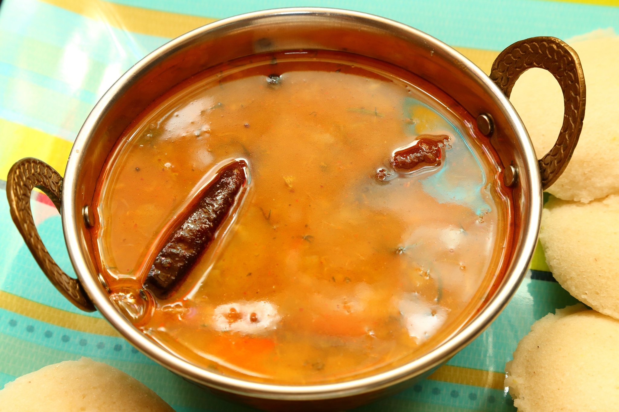 idly with sambar dish of south indian cuisine.