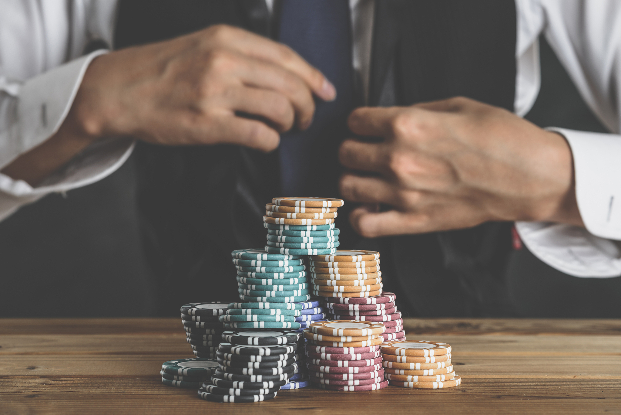 men who have a casino chip