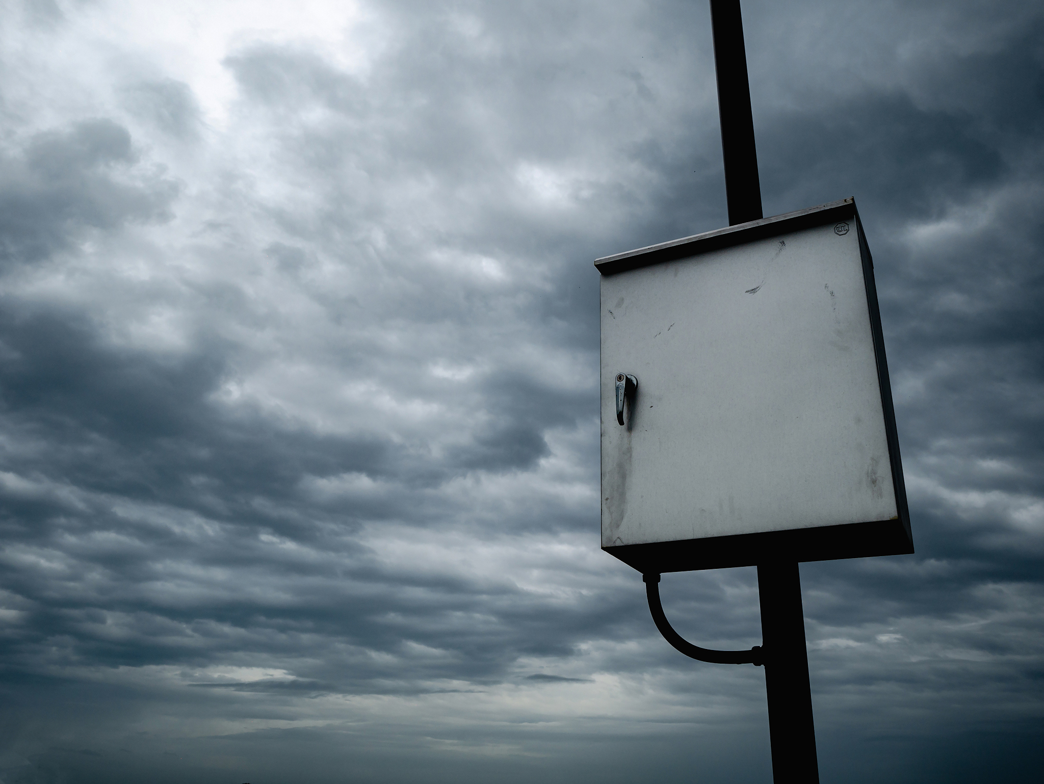 electronic control on rainy cloud sky