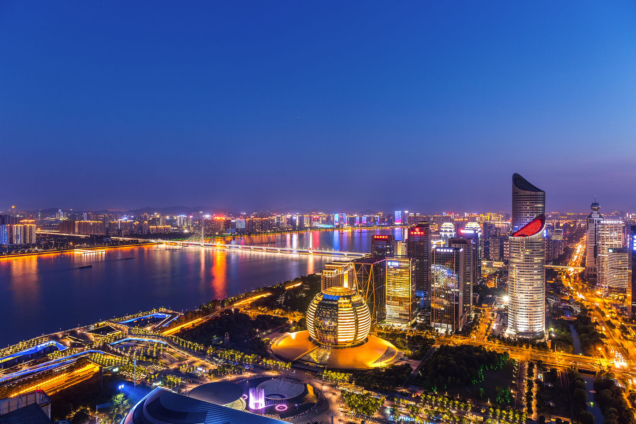 high angle view of the qiantang river and downtown cbd at night,