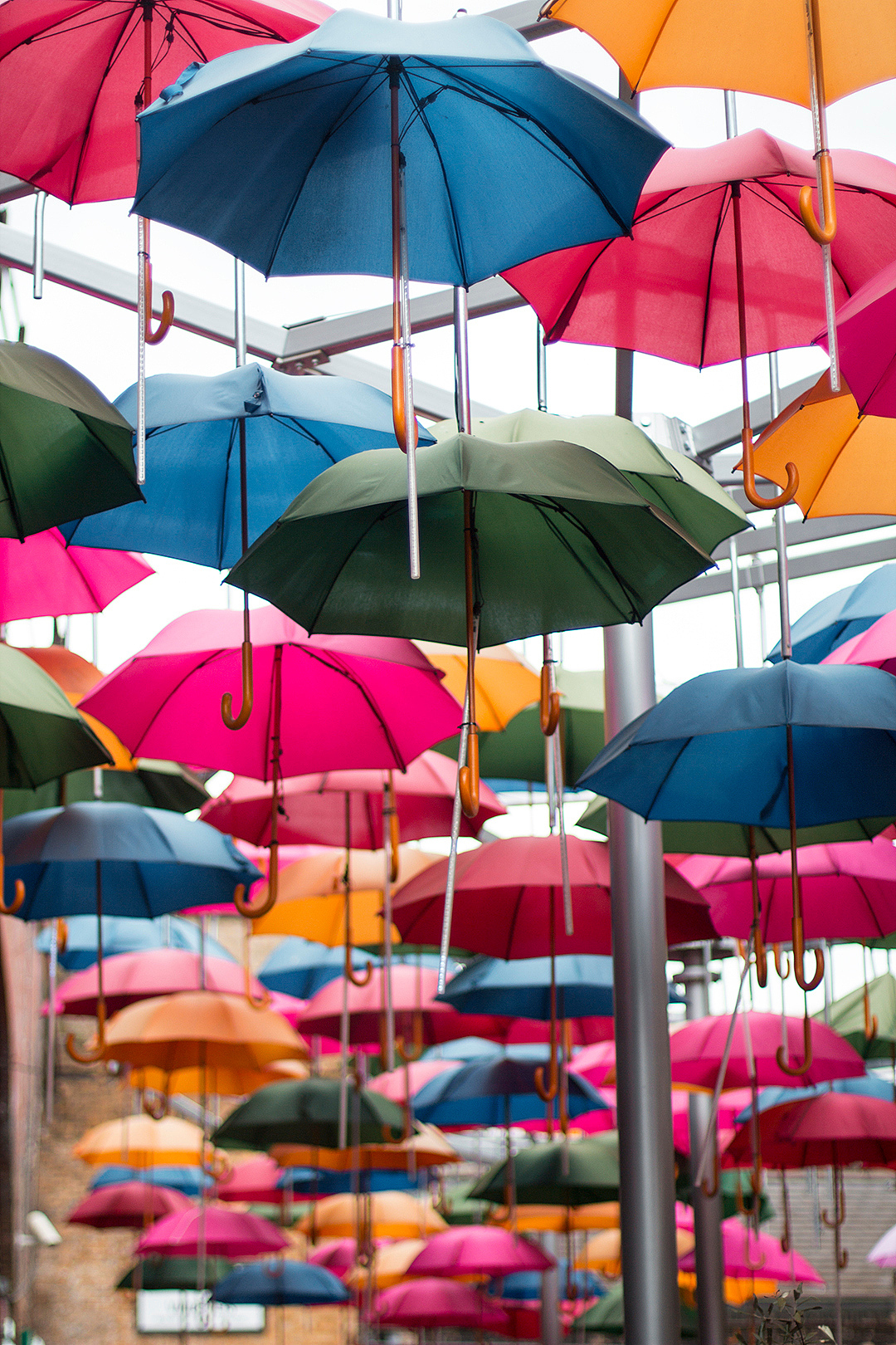full frame shot of colorful umbrellas at market stall