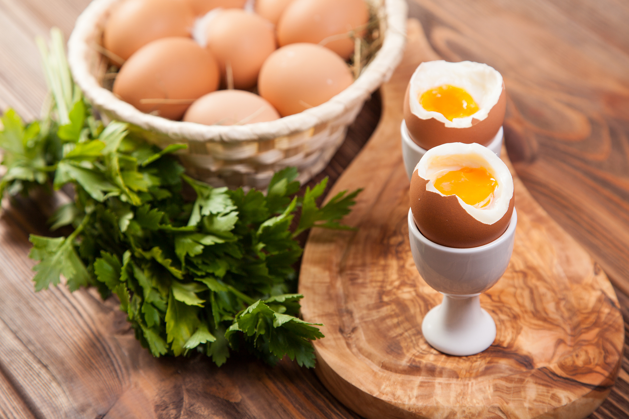boiled eggs on a wooden background