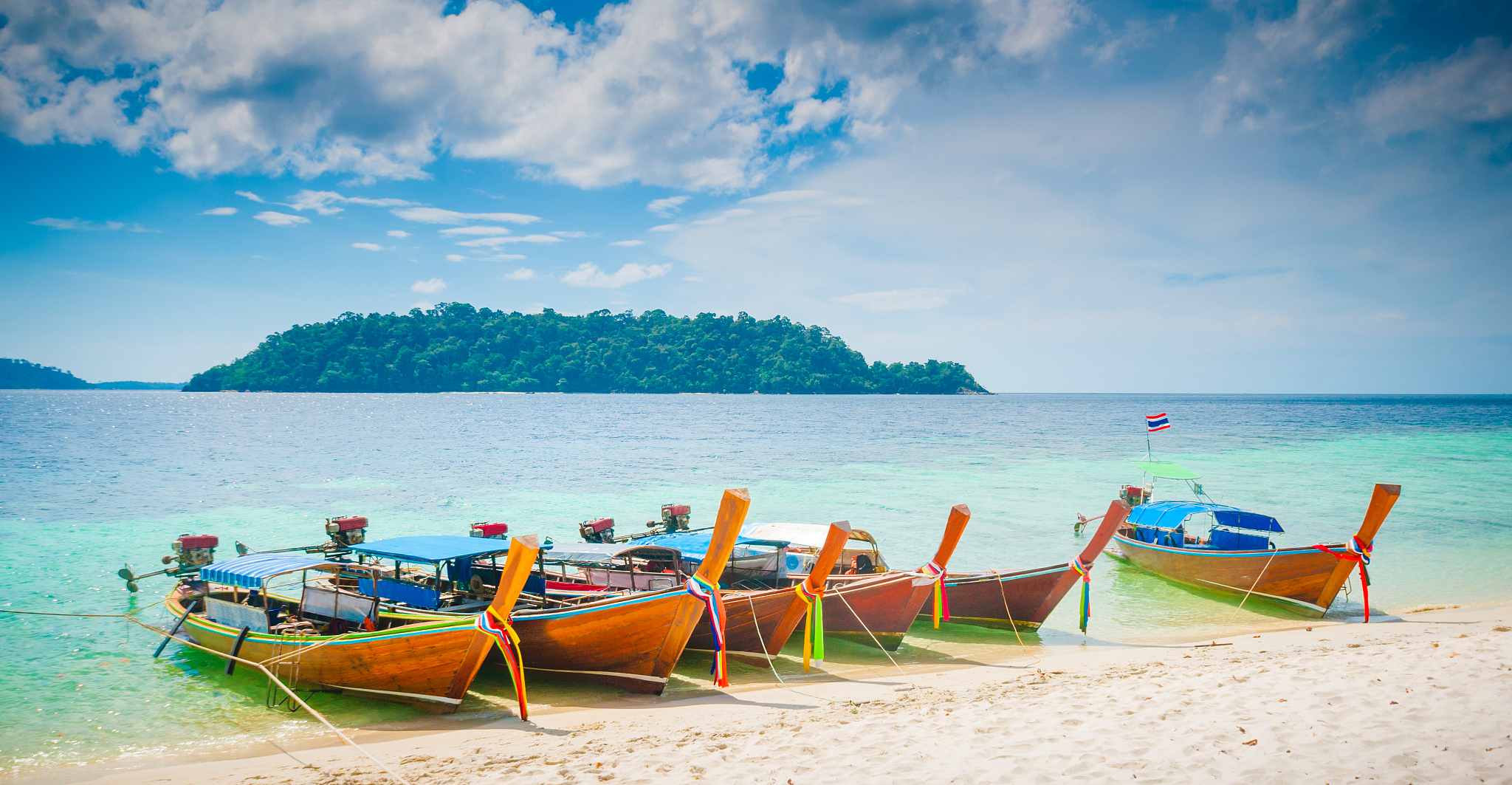 beautiful tropical sand beach against the blue sky.