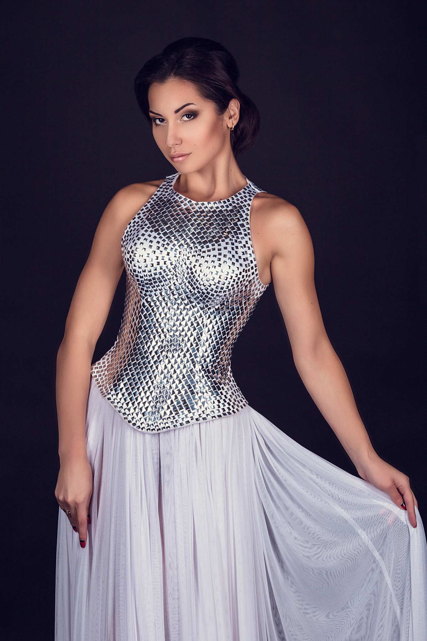 pretty sexy girl full length posing in a fashion dress