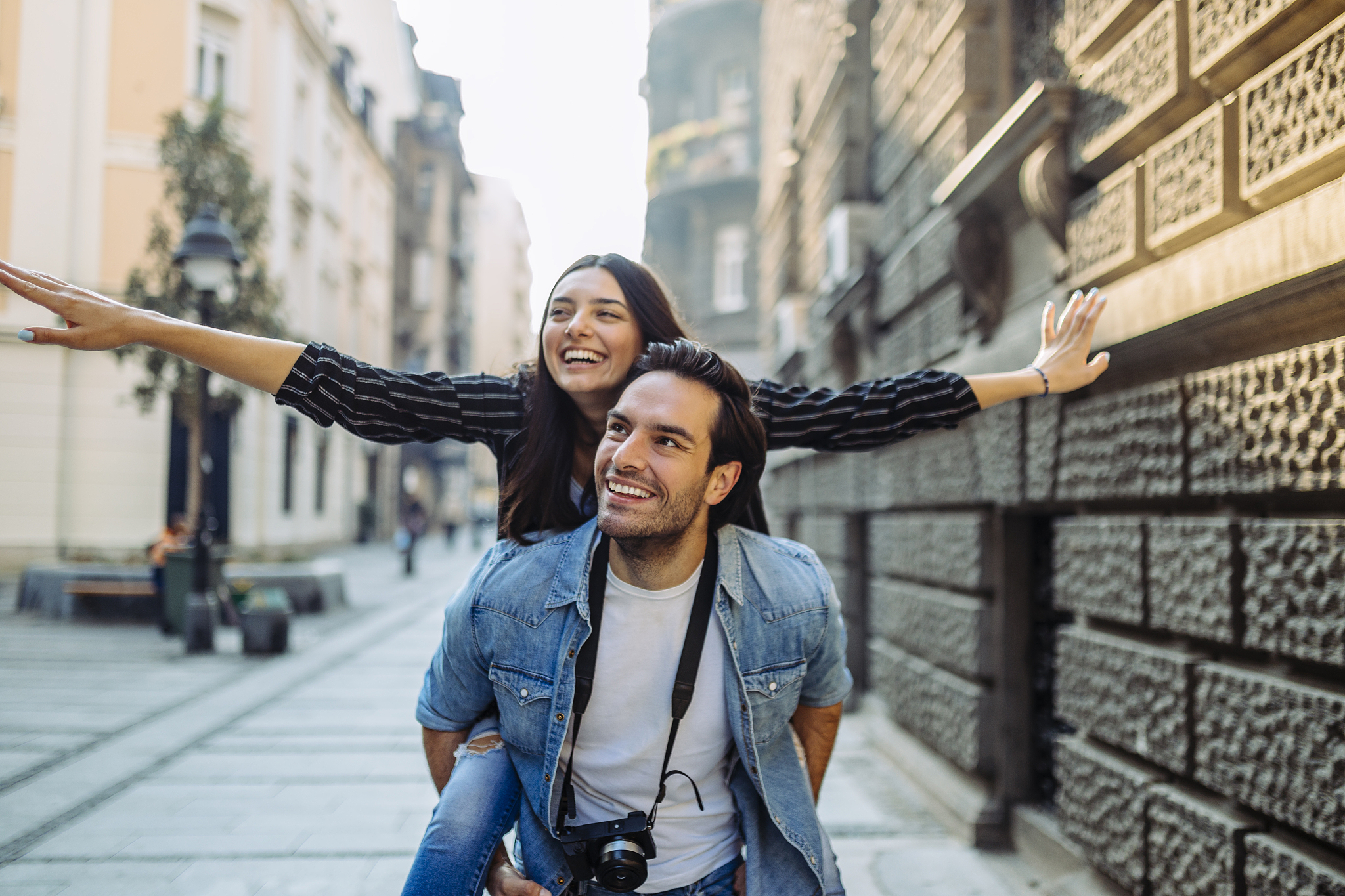 couple of tourists- piggyback