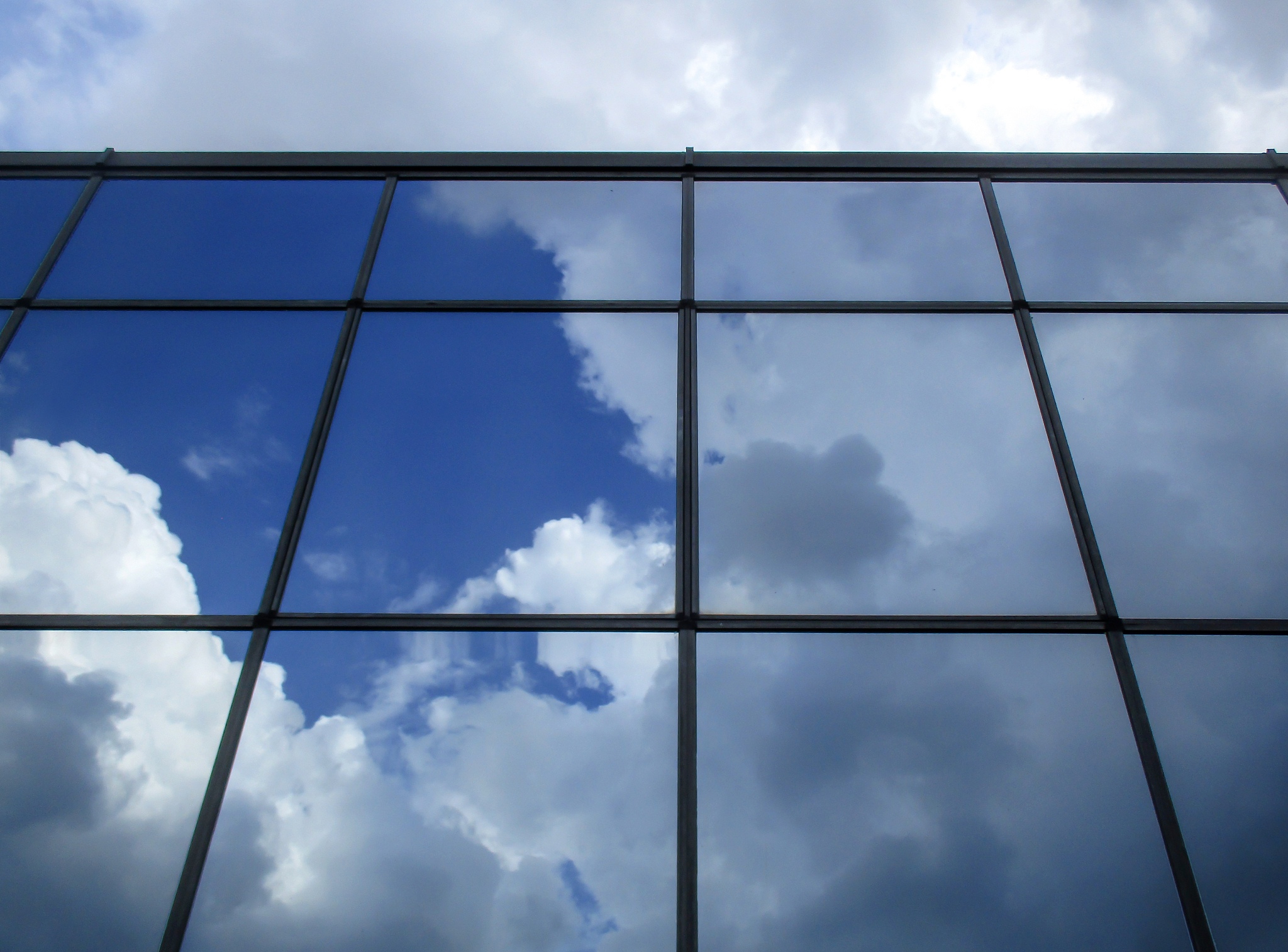 sky mirrored in windows