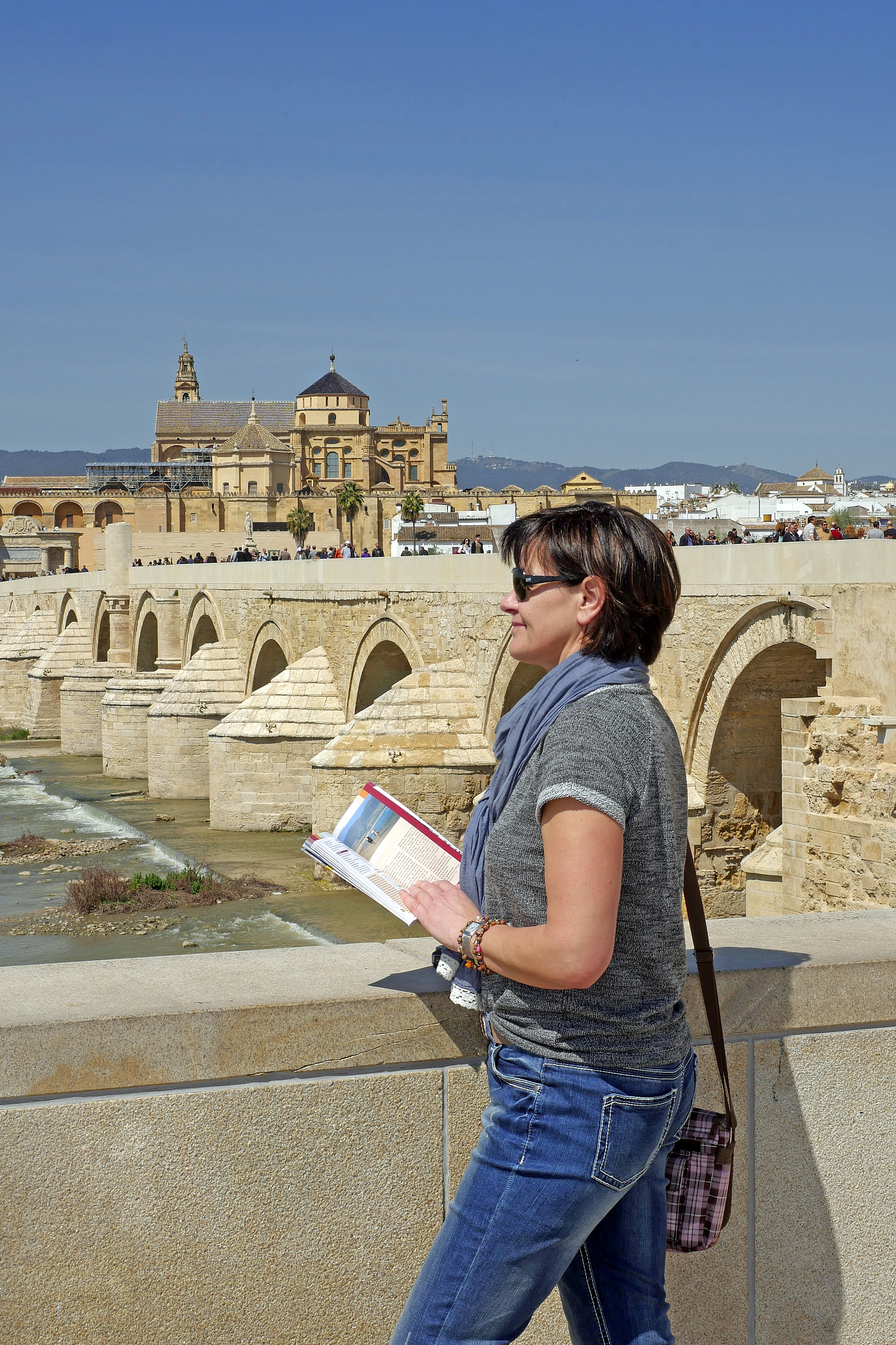 tourist, romain brigde, cordoba, andalusia