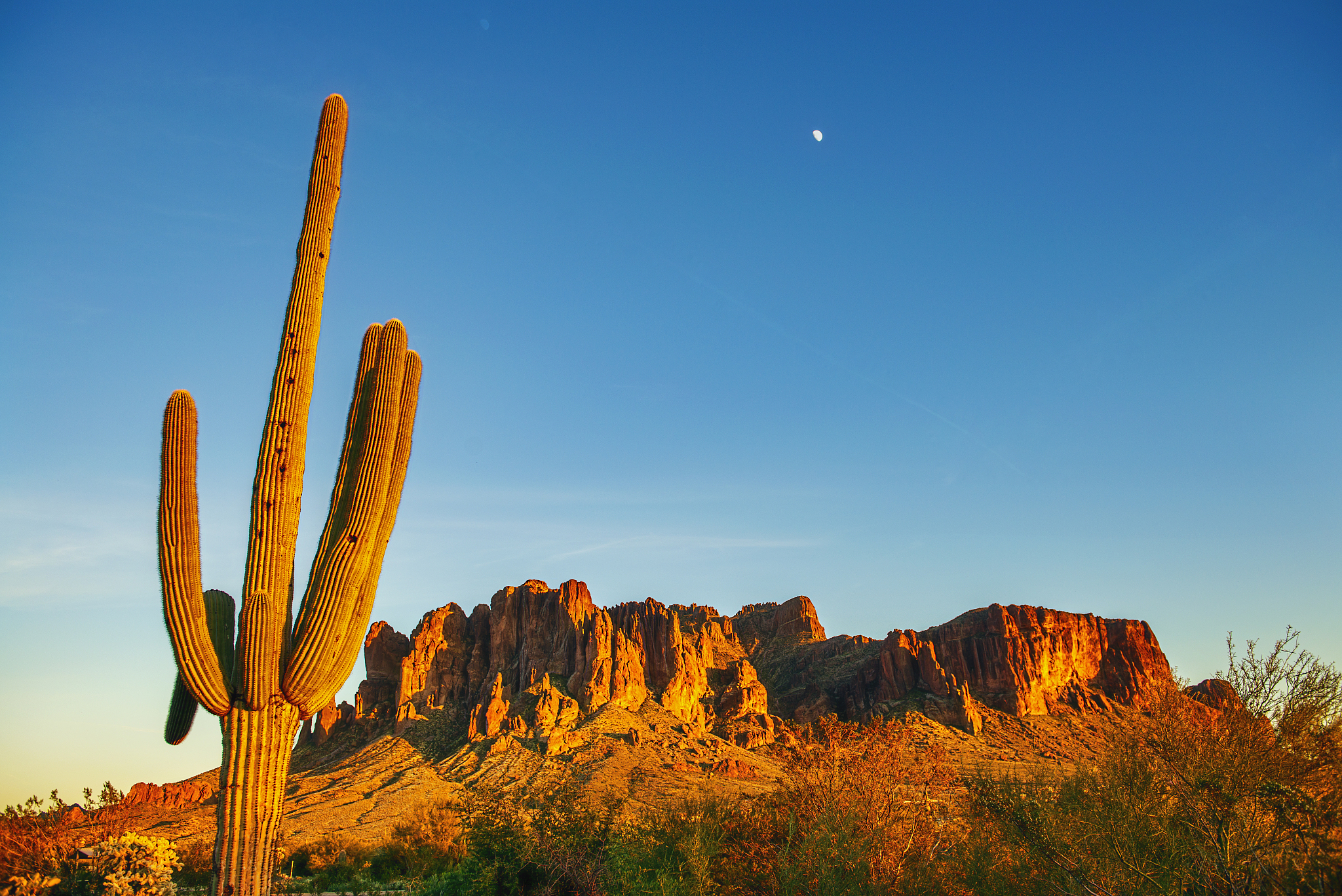 superstition mountains warm in the last glow of sunset