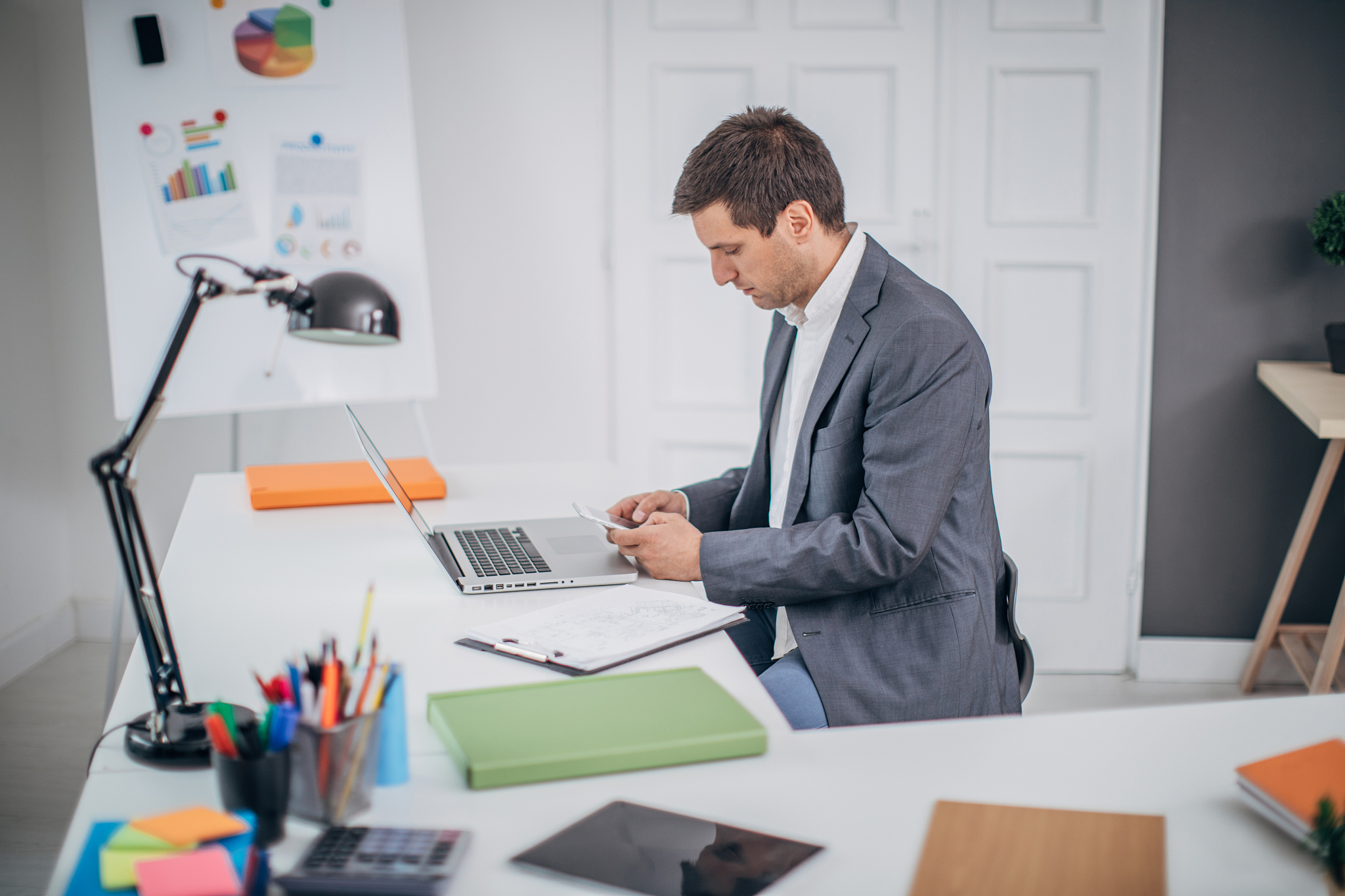 businessman texting on mobile phone