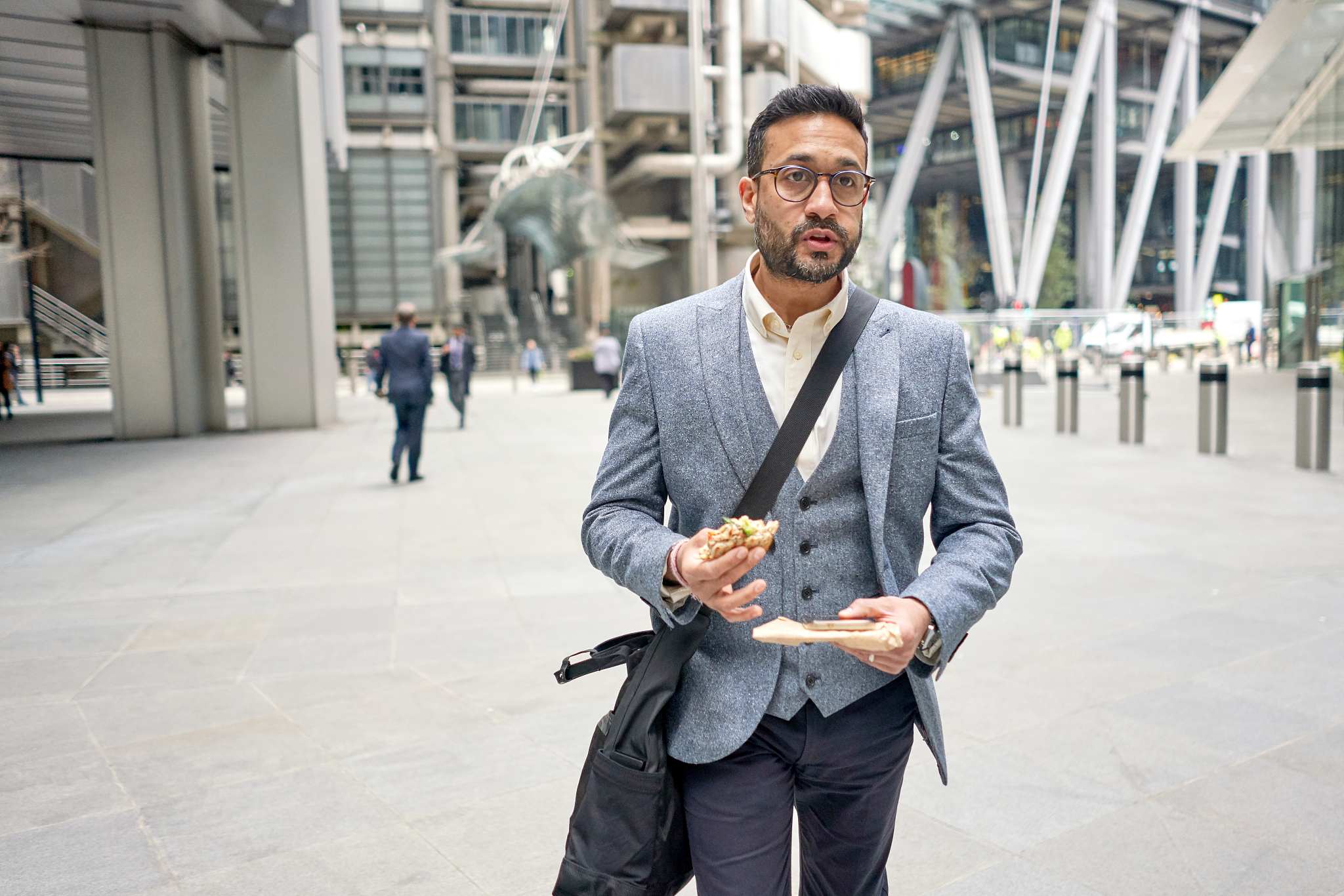 a business man on the go in the city streets.