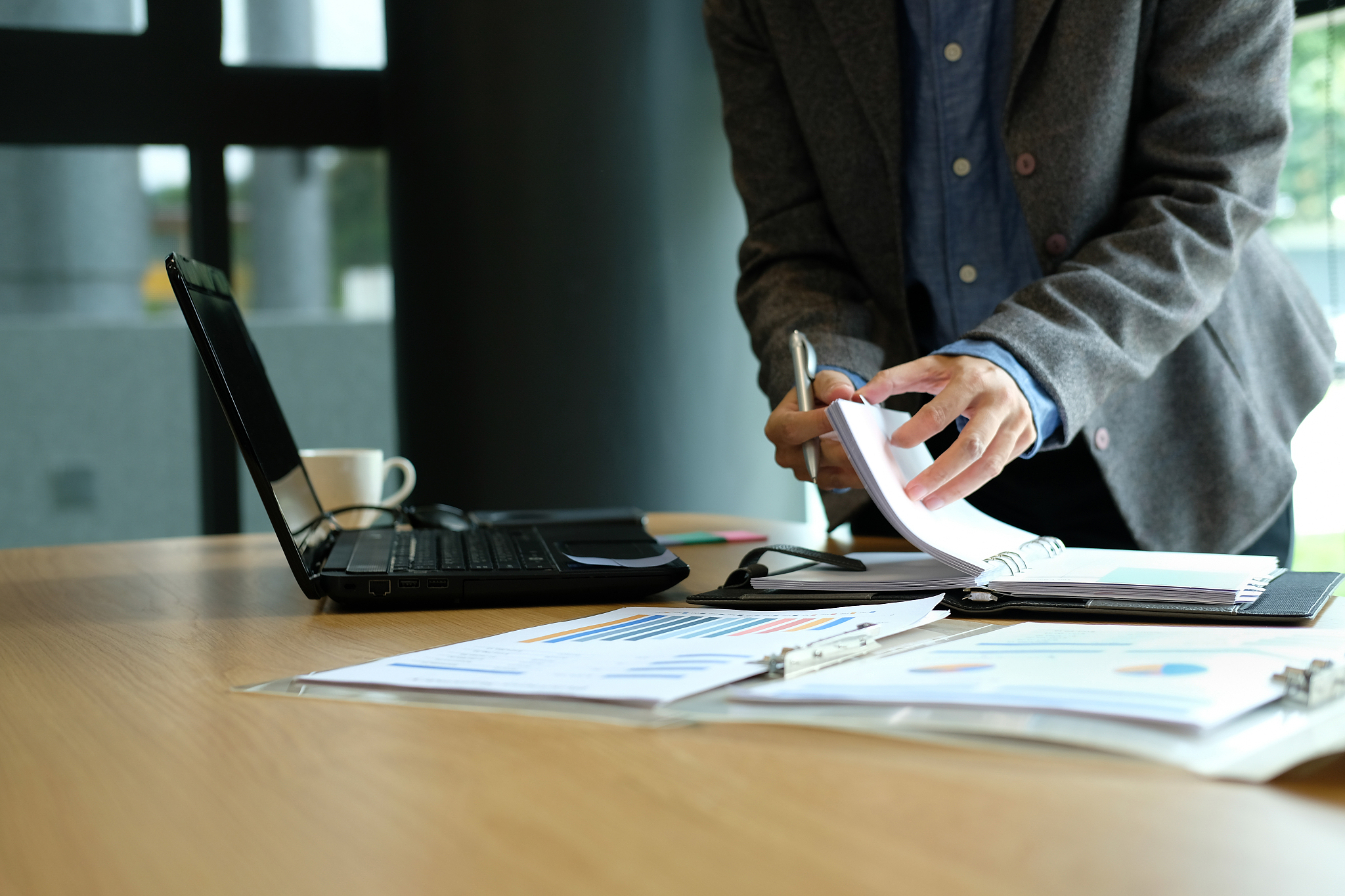 businessman with notebook working organizing plan at workplace