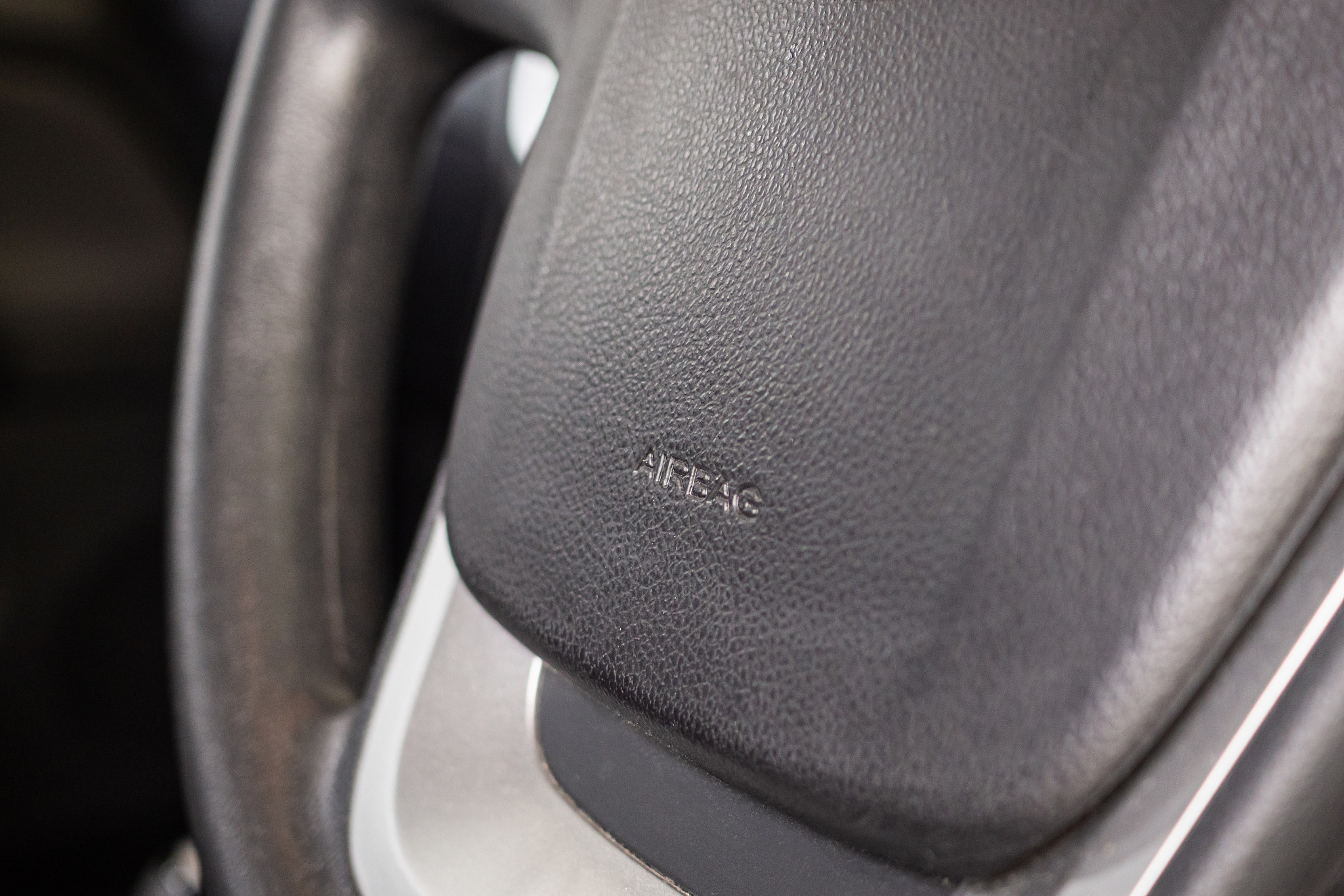 safety airbag sign on car steering wheel