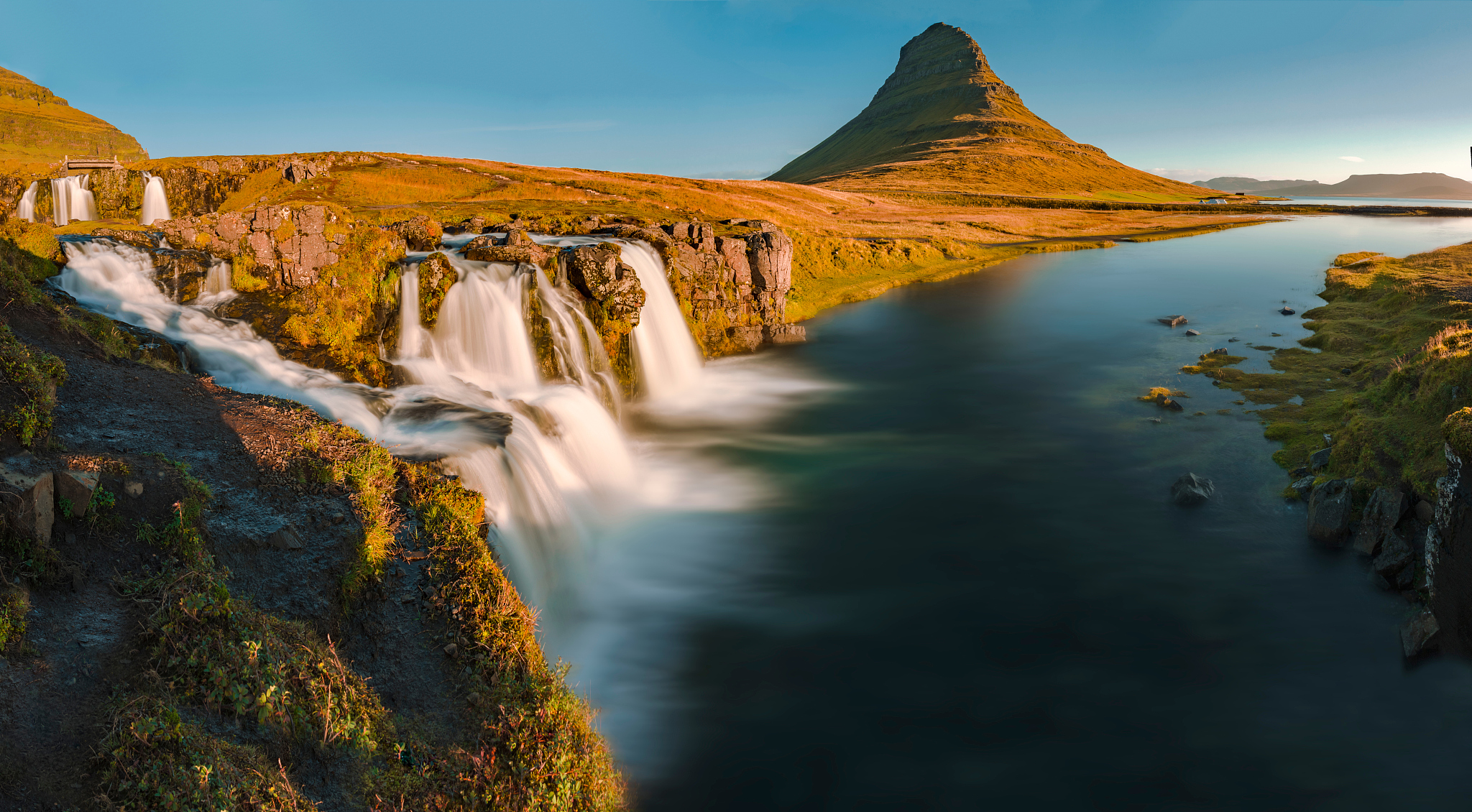 scenic view of waterfall against sky