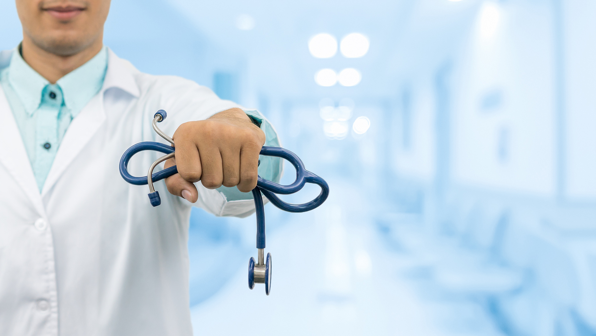 male doctor on hospital background