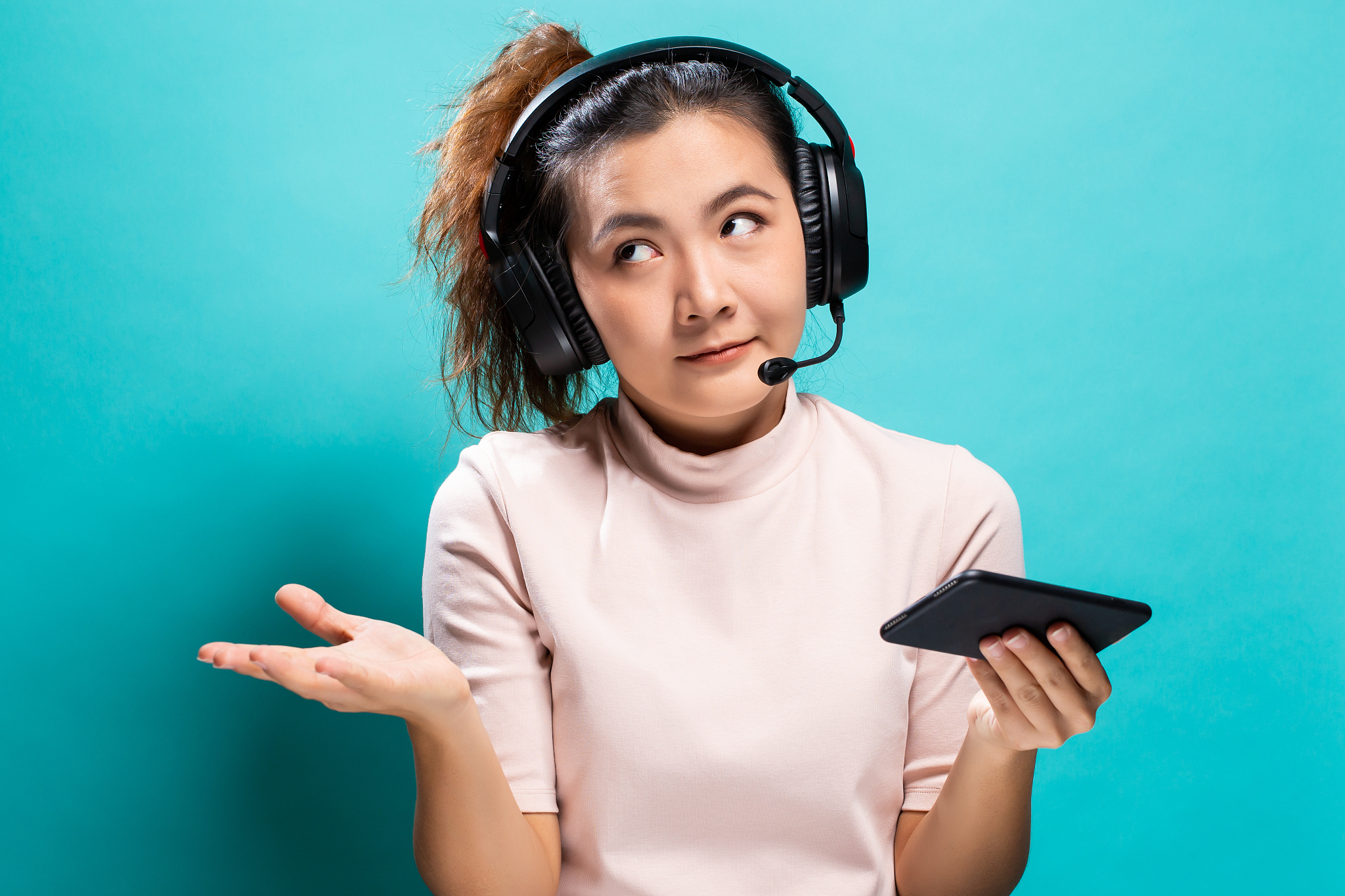 angry woman playing to the game from smartphone