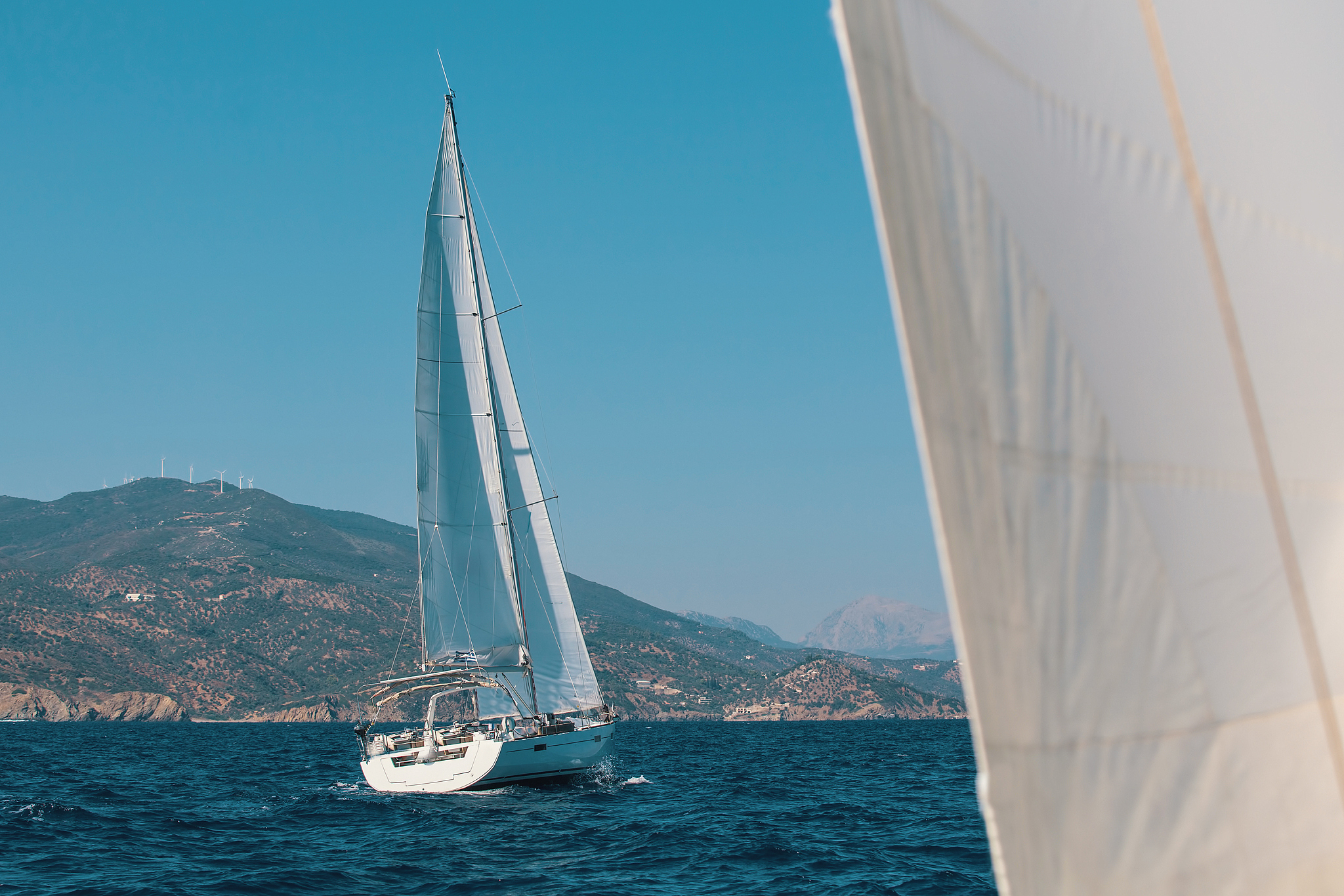 sailboats during a cruise in the aegean sea. luxury yachts, mari