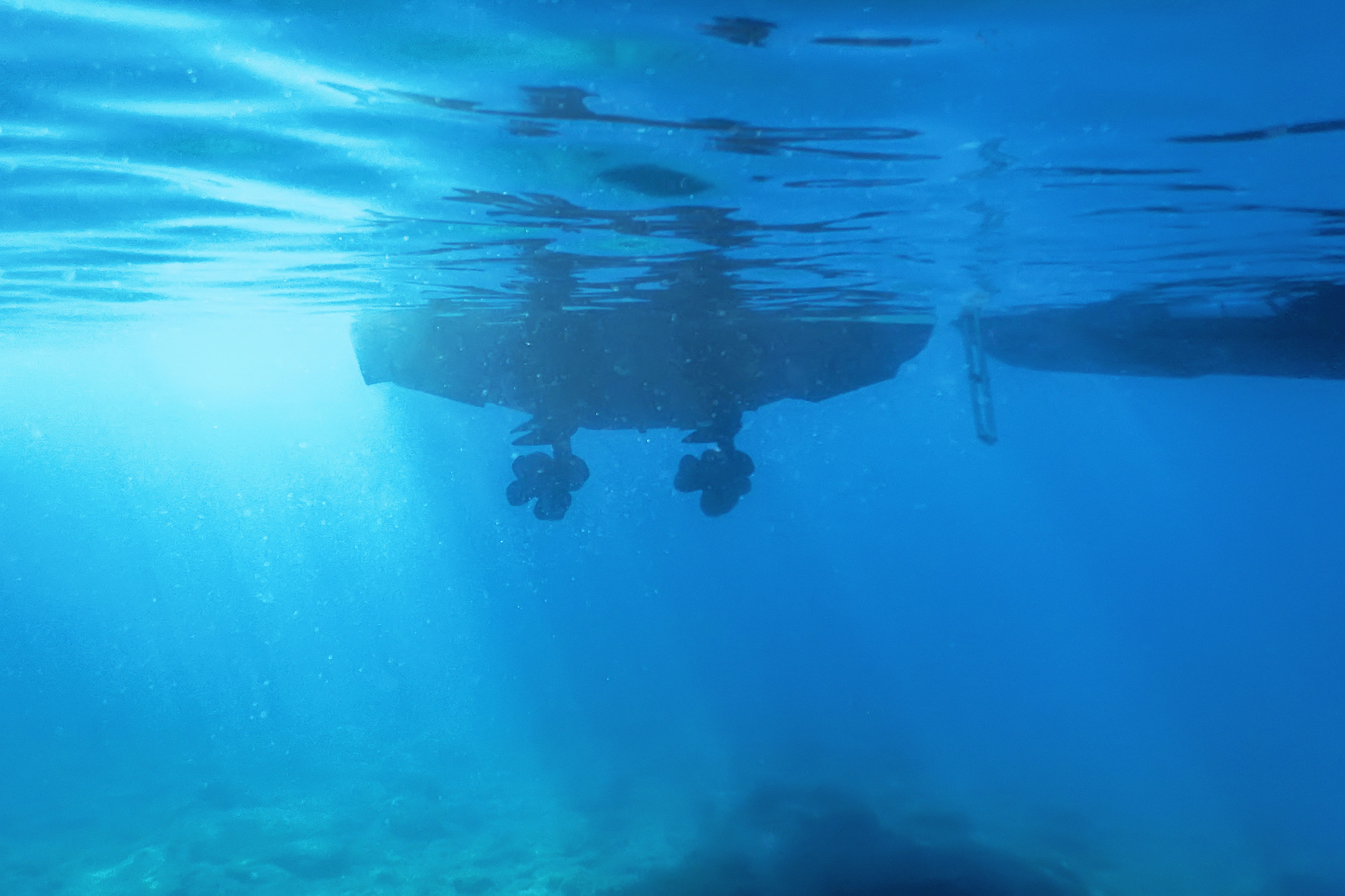 engine motor boat propeller underwater sea surface