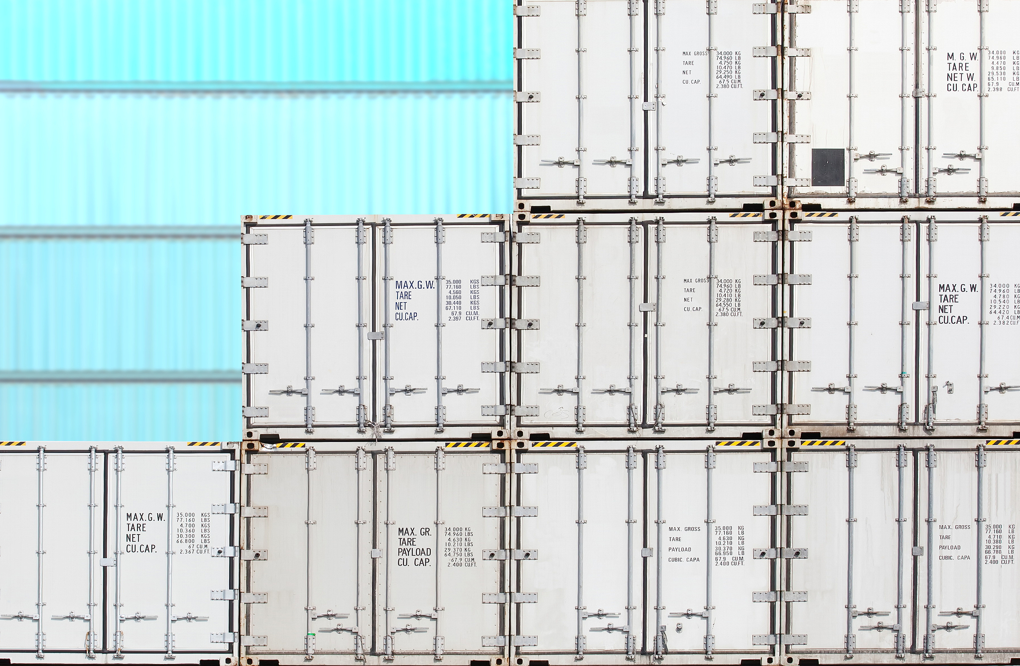 colorful stack of container shipping at dockyard