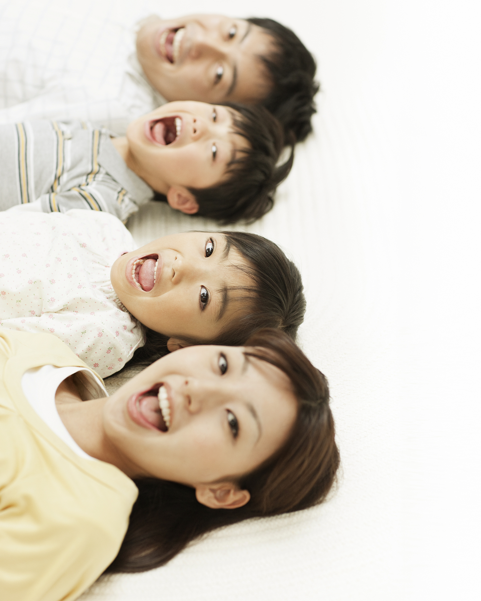 family lying in a row