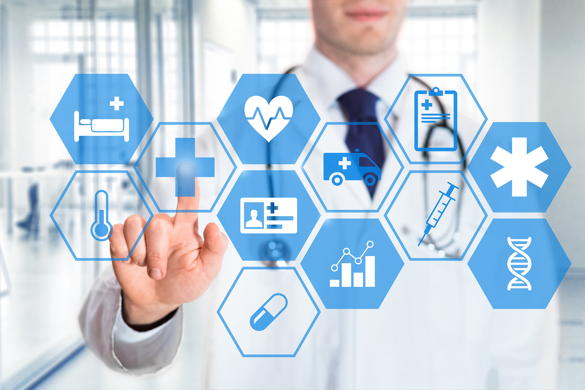 medical doctor touching icons of healthcare services on digital 