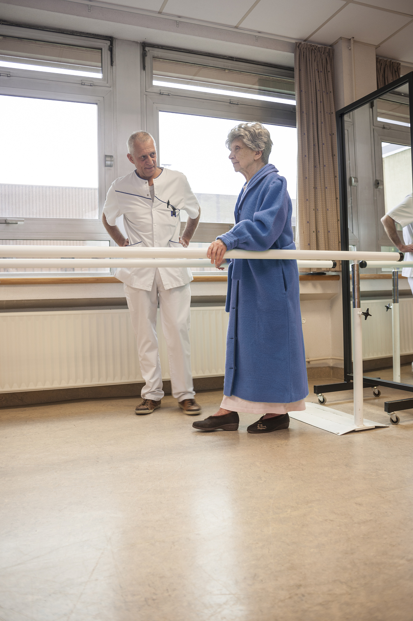 physical therapist working with patient