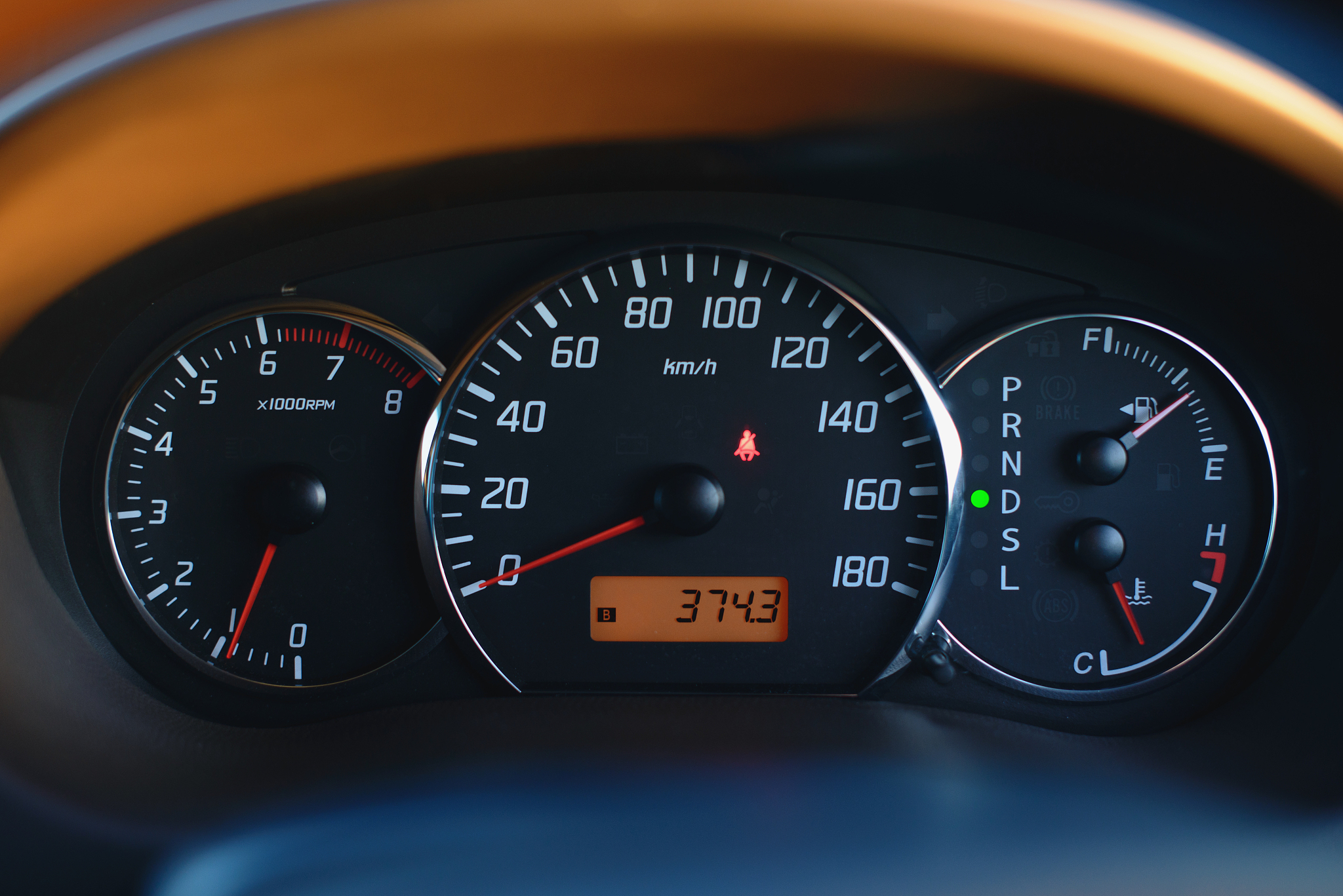 car dashboard with speedometer and tachometer in black color, cl