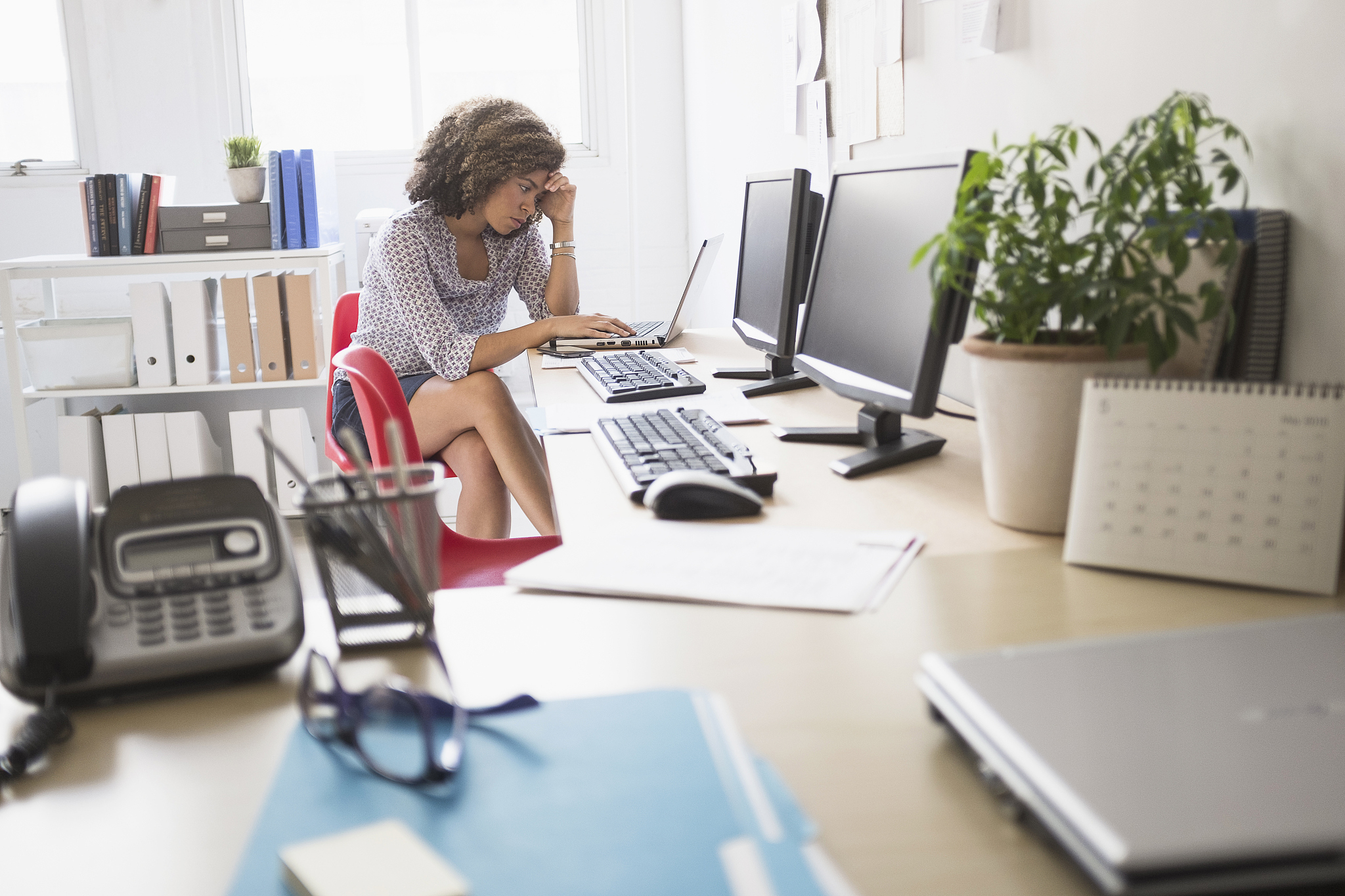 young woman working at office