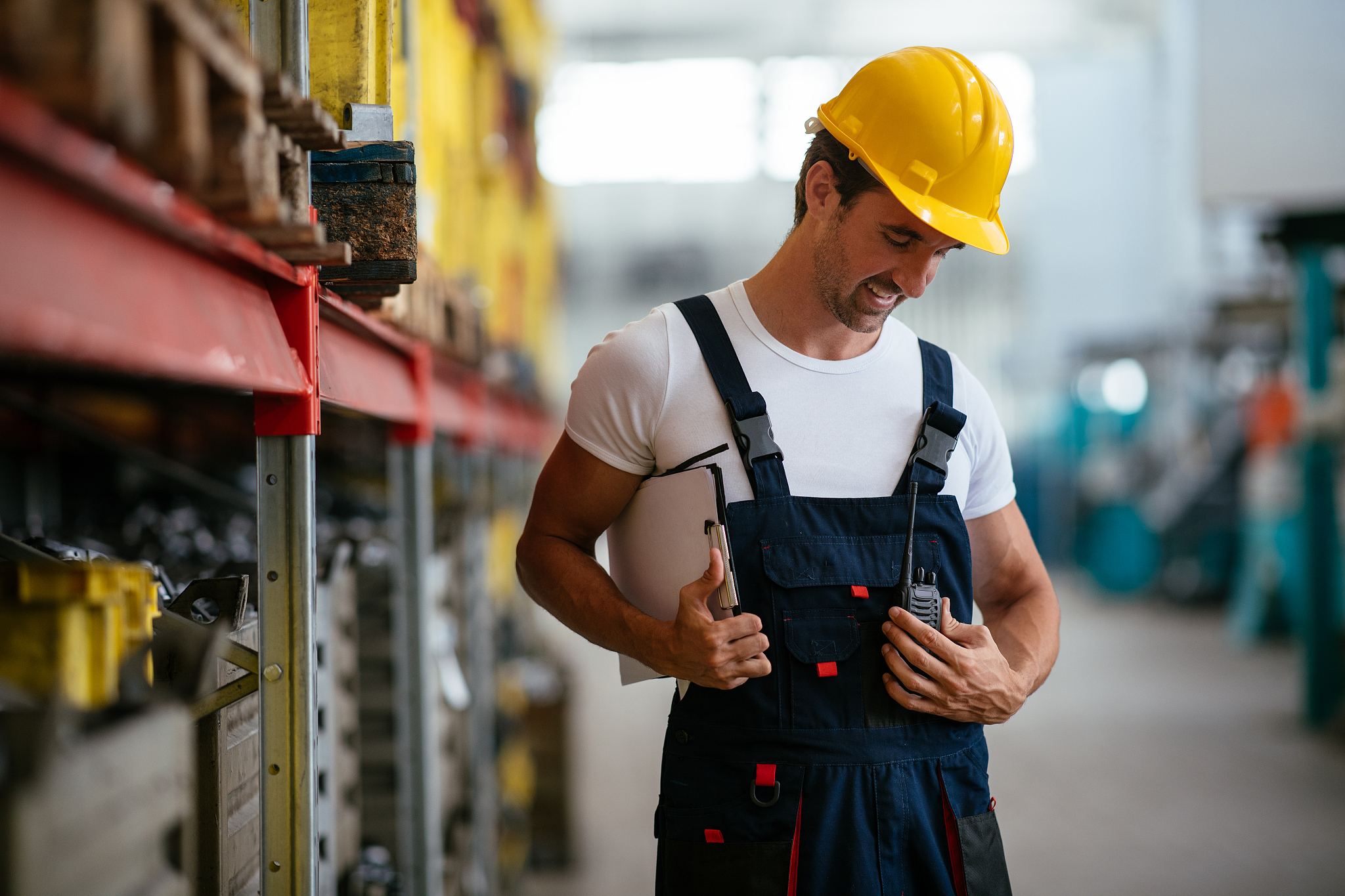 factory worker controlling production