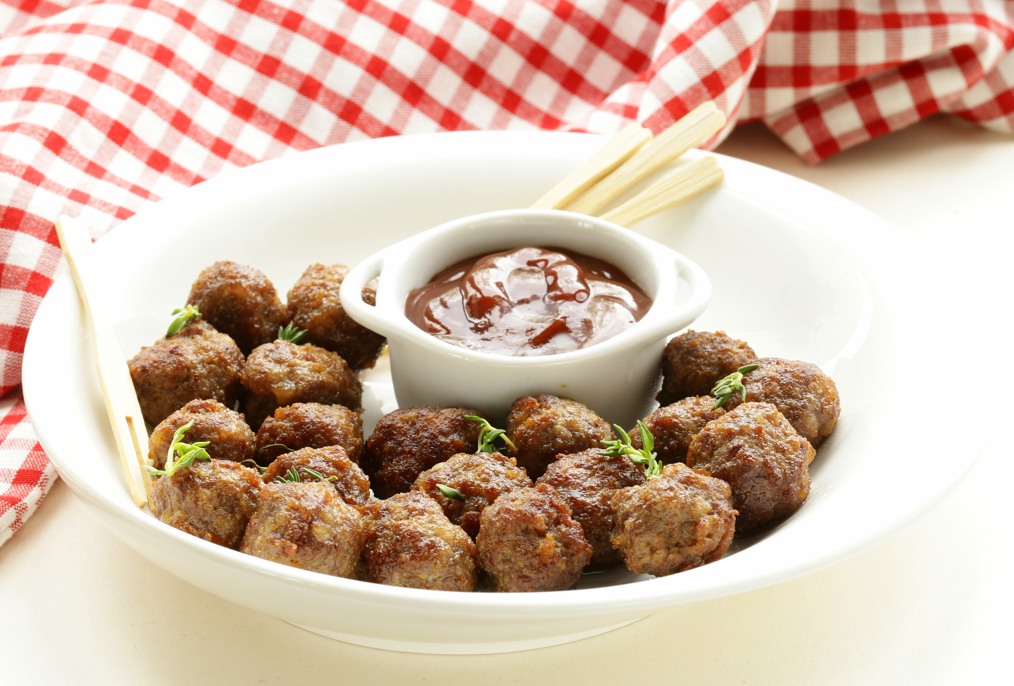 meatballs - traditional meat dish with sauce and herbs