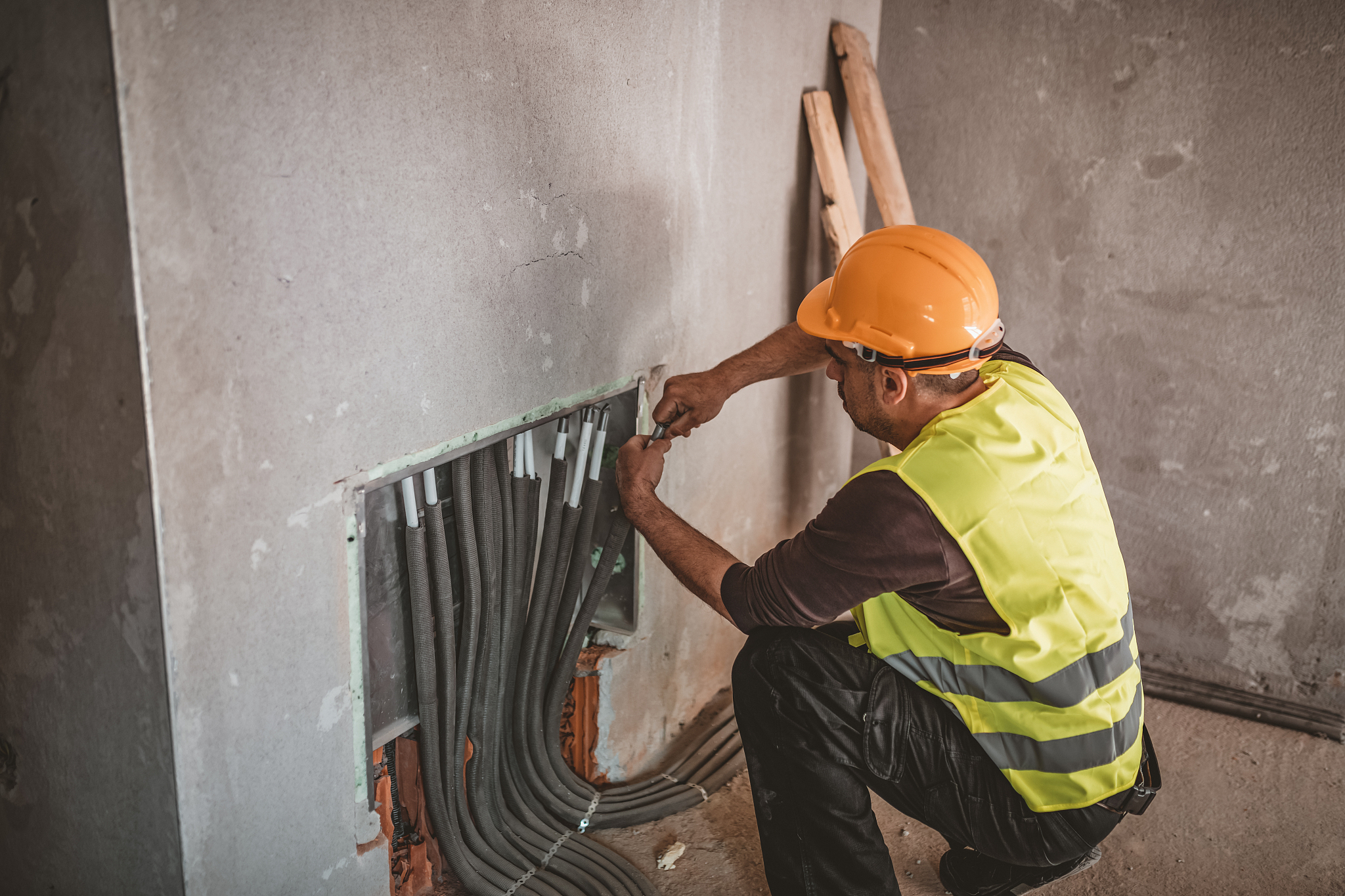 maintenance engineer is working inside the building site