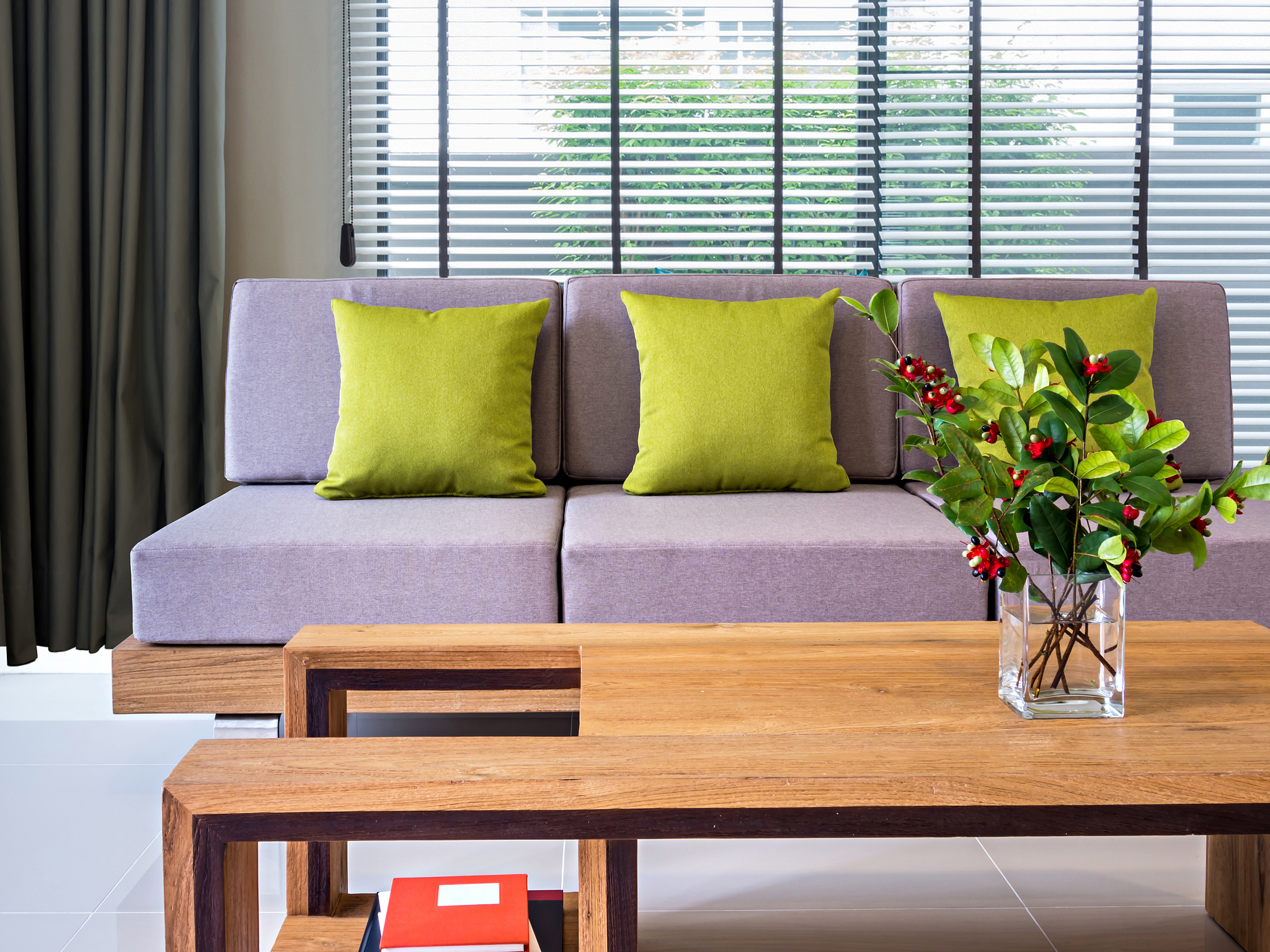 interior design of  modern living room with couch, flower vase