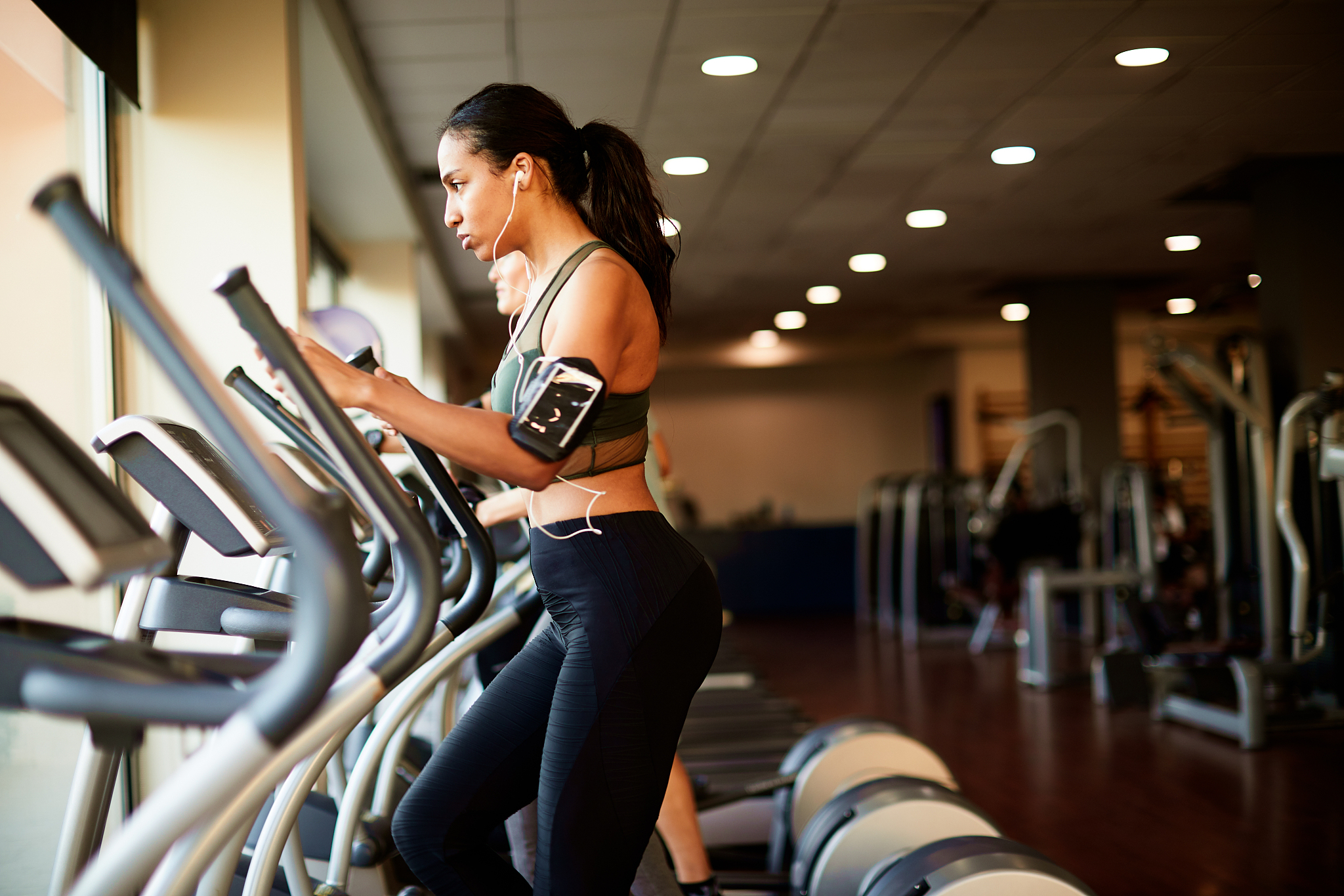 lifestyle  gym and fitness work out one the elliptical.