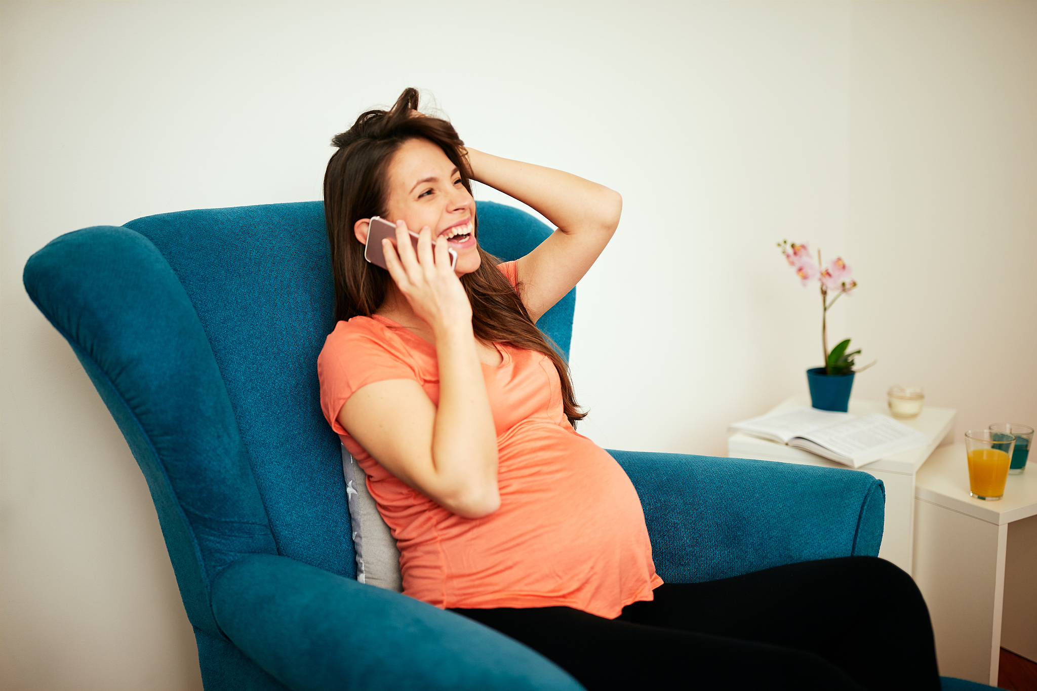 pregnant woman using smart phone.