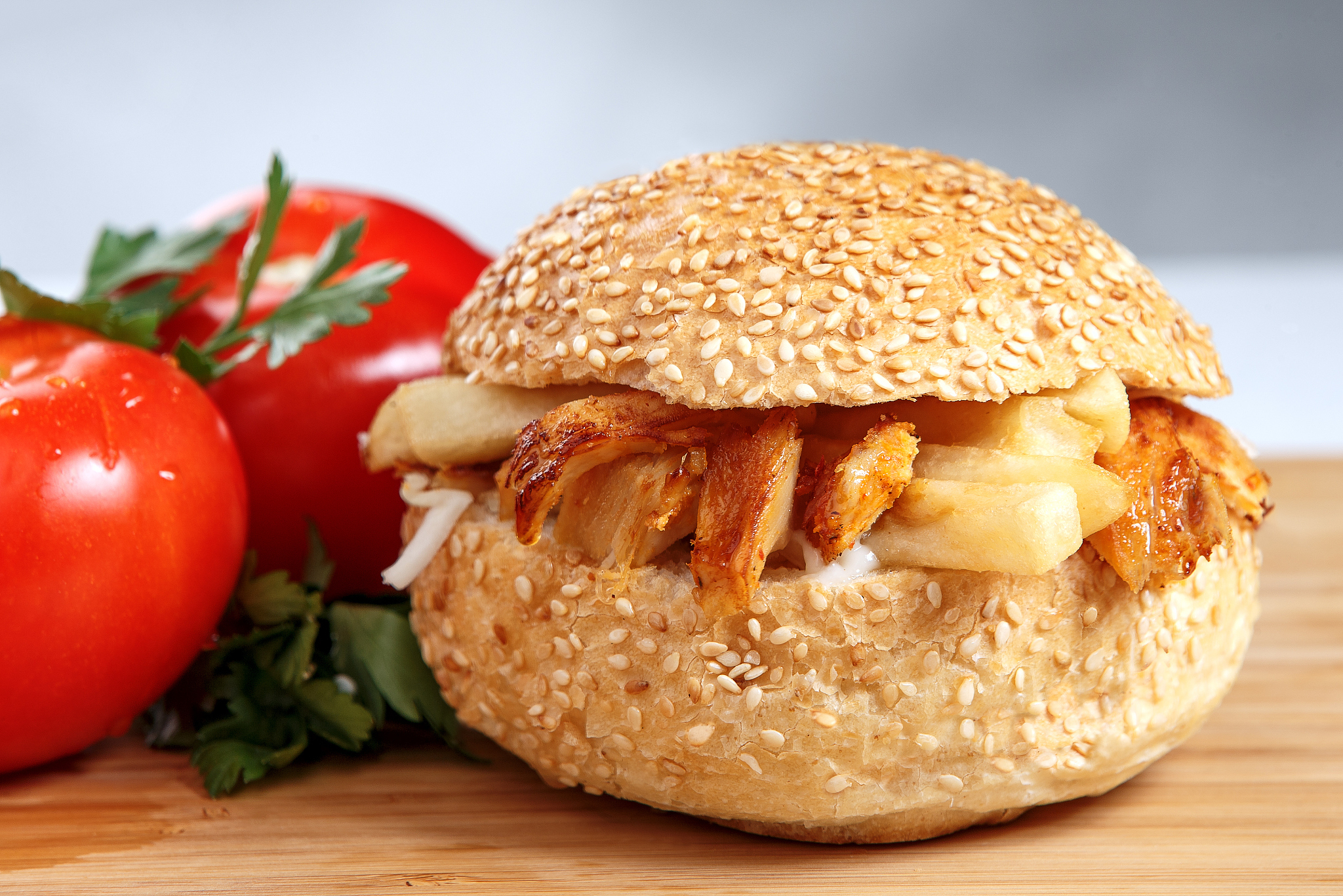 takeaway burger with tomatoes and parsley
