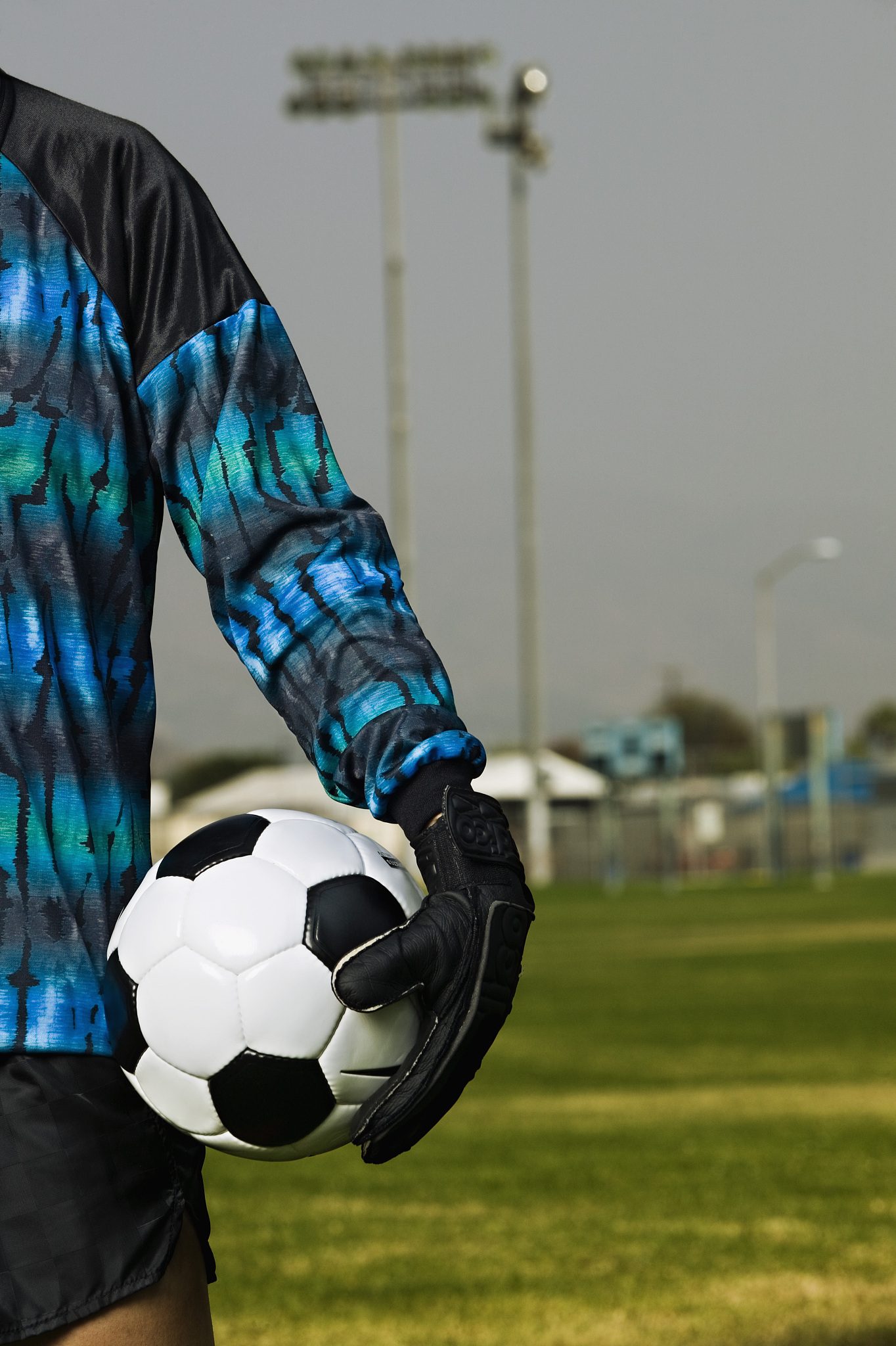 person holding soccer ball