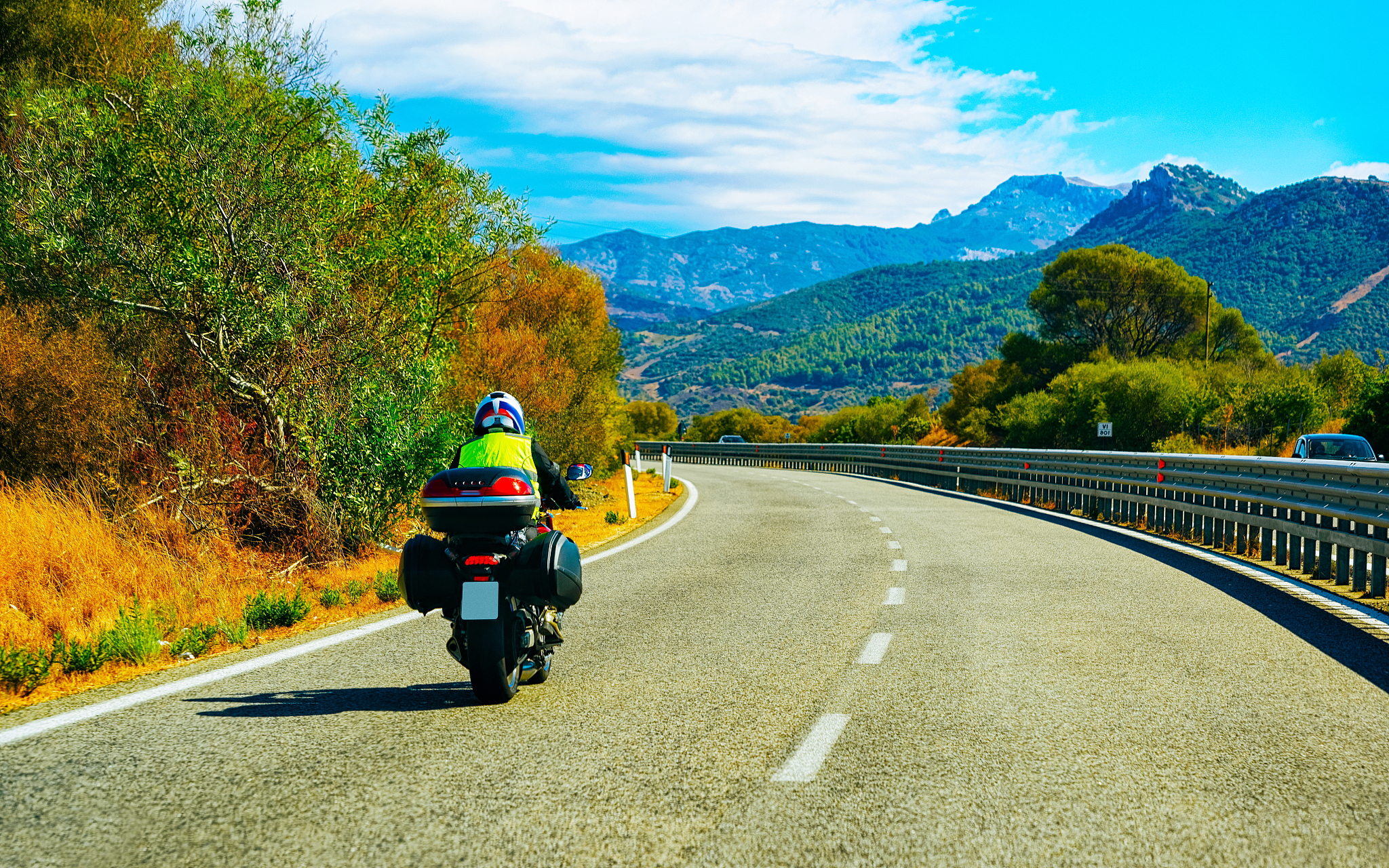 motorcycle at the road in costa smeralda in sardinia reflex