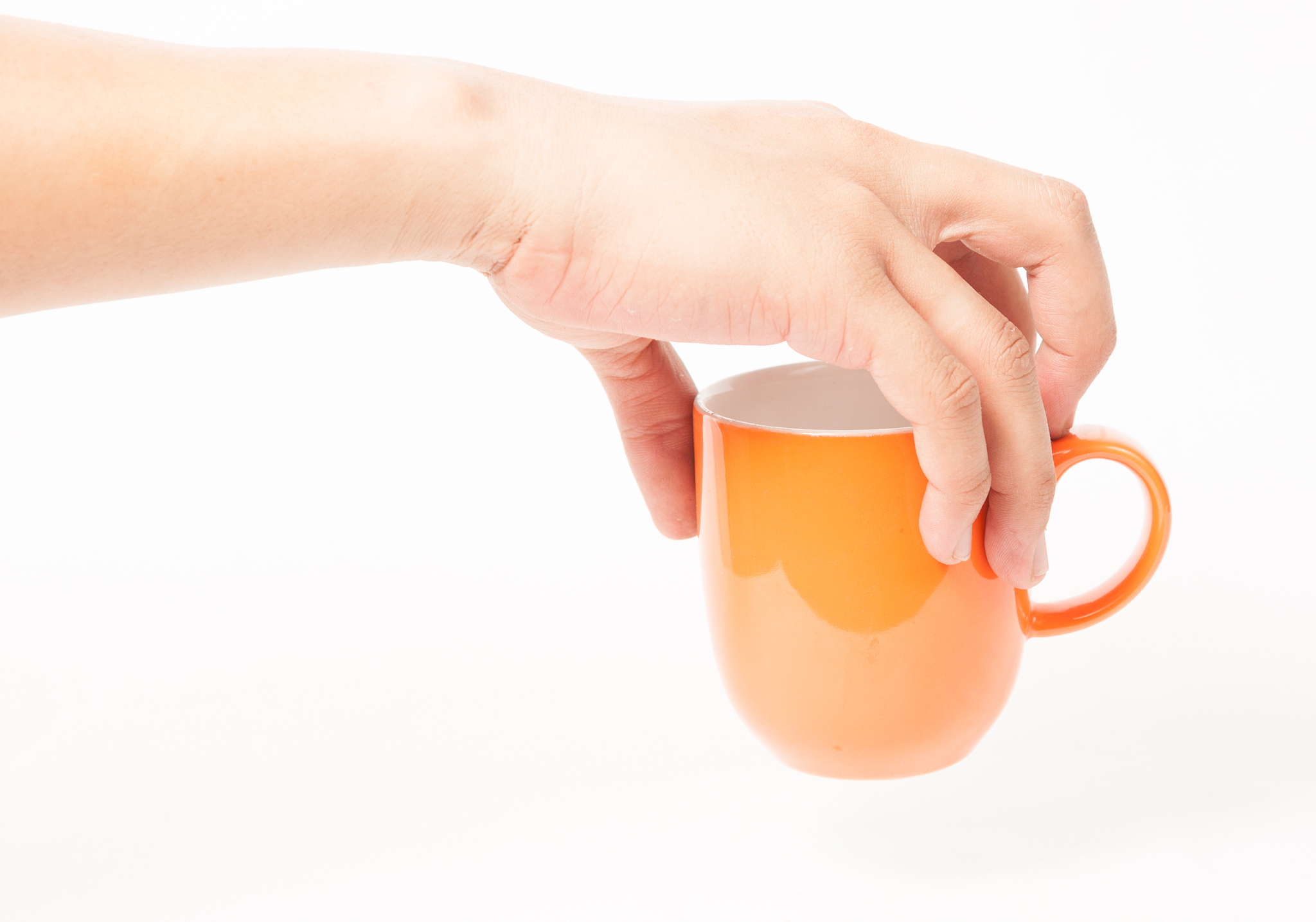 man holding a cup of coffee,