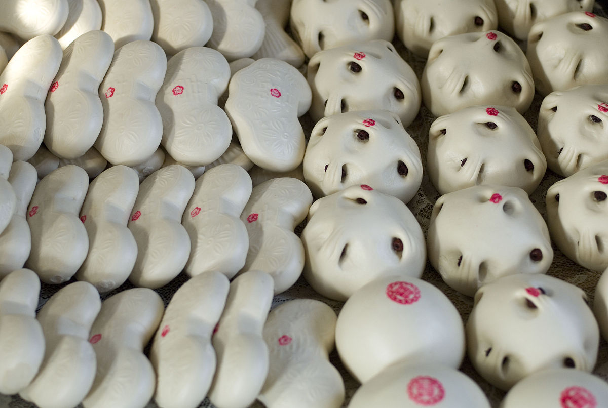 结合山东饮食民俗分析一下为什么山东人喜欢吃馒头？