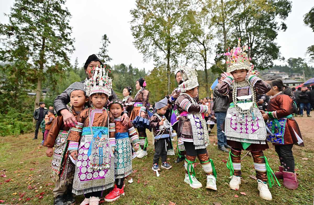 2020年11月24日,身着盛装的村民在贵州省从江县下江镇隆里村芦笙节上.