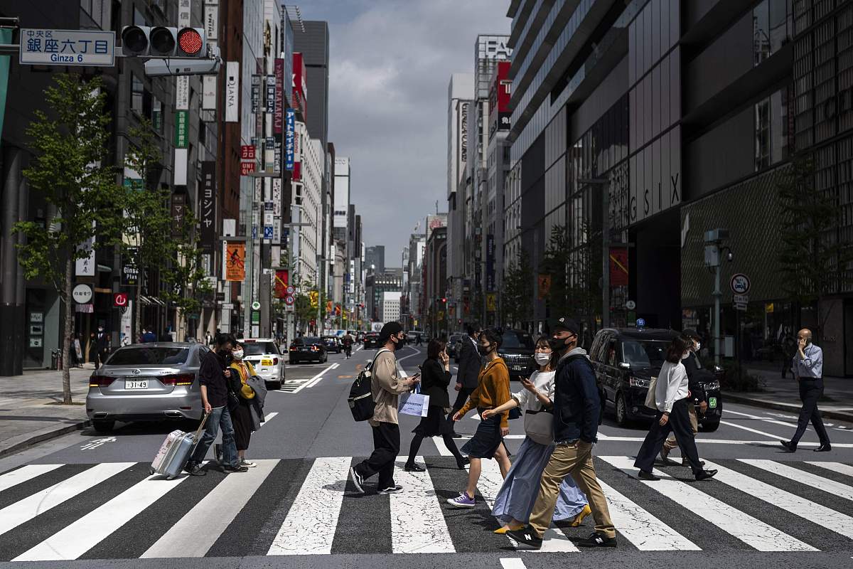 当地时间2021年4月1日,日本东京,民众戴口罩出行.世界卫生组织官网最