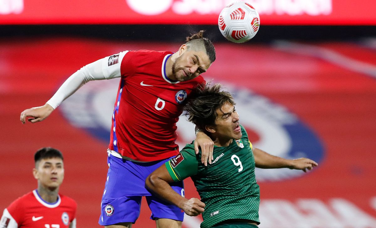 chile's francisco sierralta (l) and bolivia's marcelo martins vi