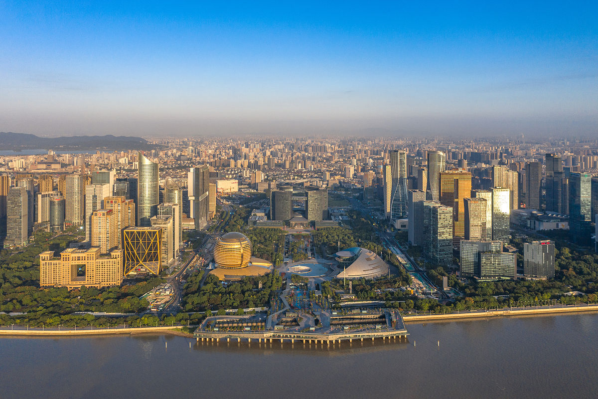2020年10月8日,浙江杭州,航拍日出时的钱江新城城市天际线全景.