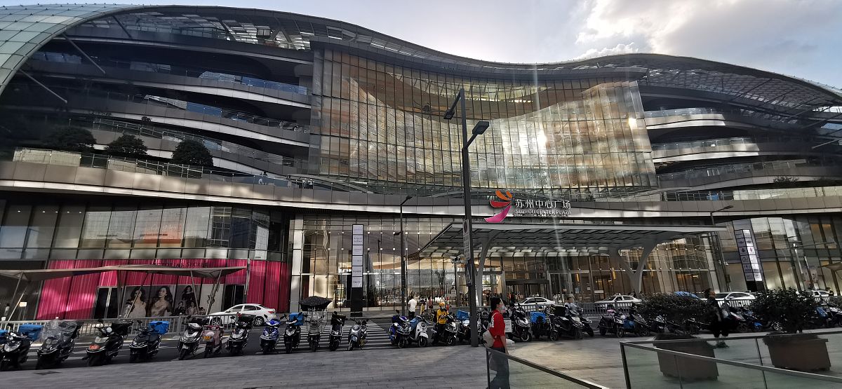 下面文字翻译成英文：想占用你两分钟时间南京德基ooh的设计需要你确认明天需要提交给商场我的英文不太好邀请jason一起帮忙听一下